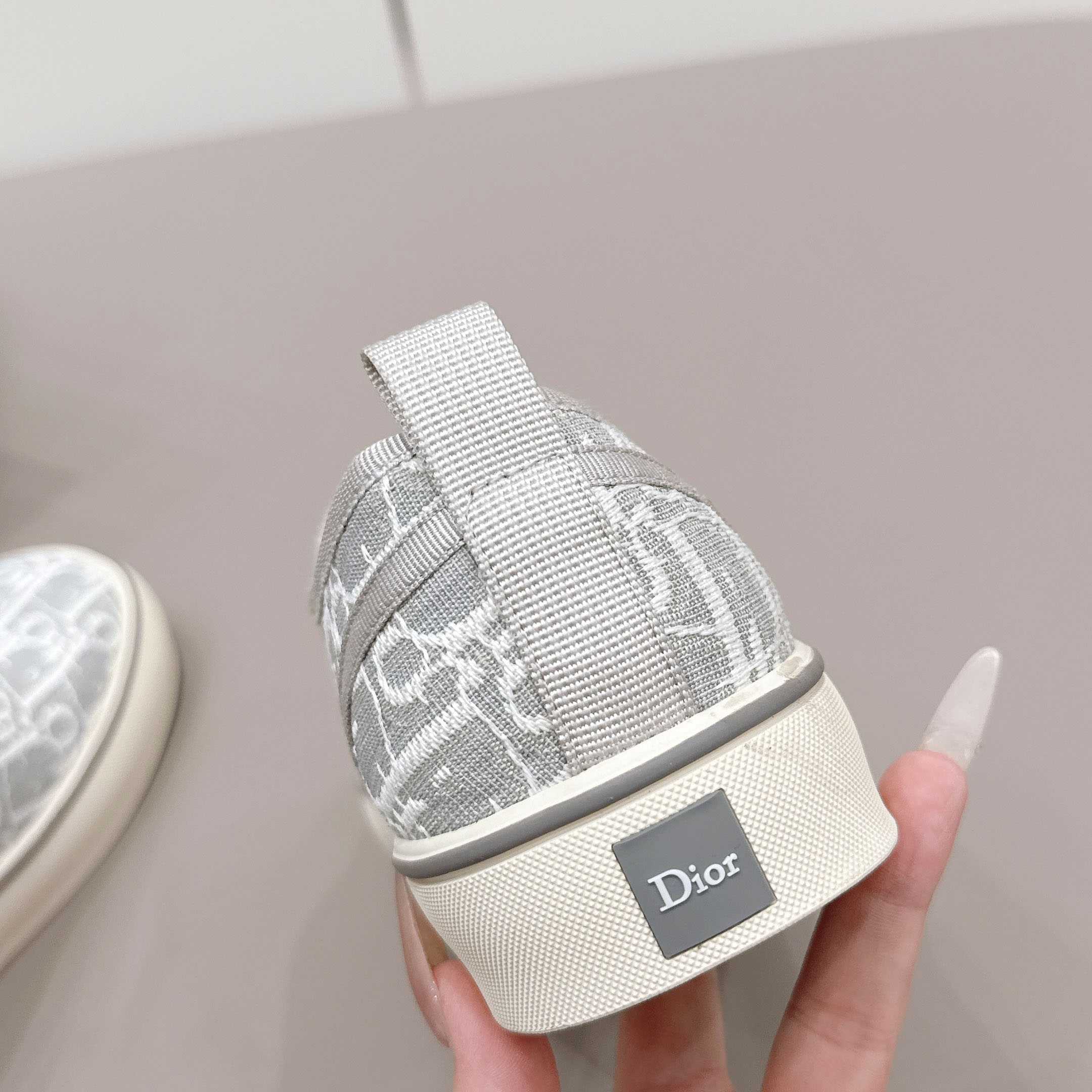 Dior Saltwind Slip-On Sneaker - FashionPlug