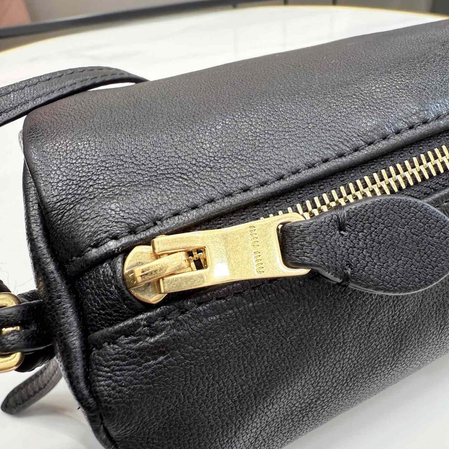 Miu Miu Nappa Leather Pouch - FashionPlug
