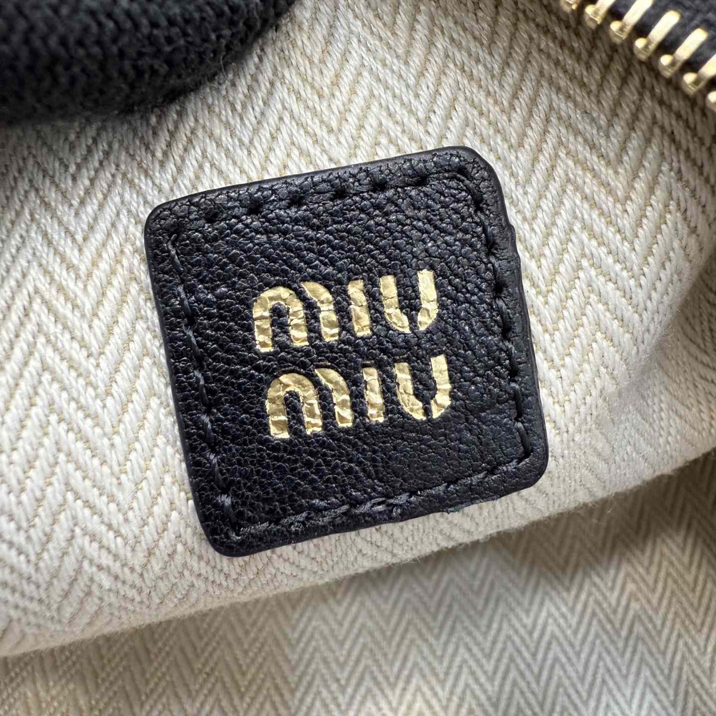 Miu Miu Nappa Leather Pouch - FashionPlug