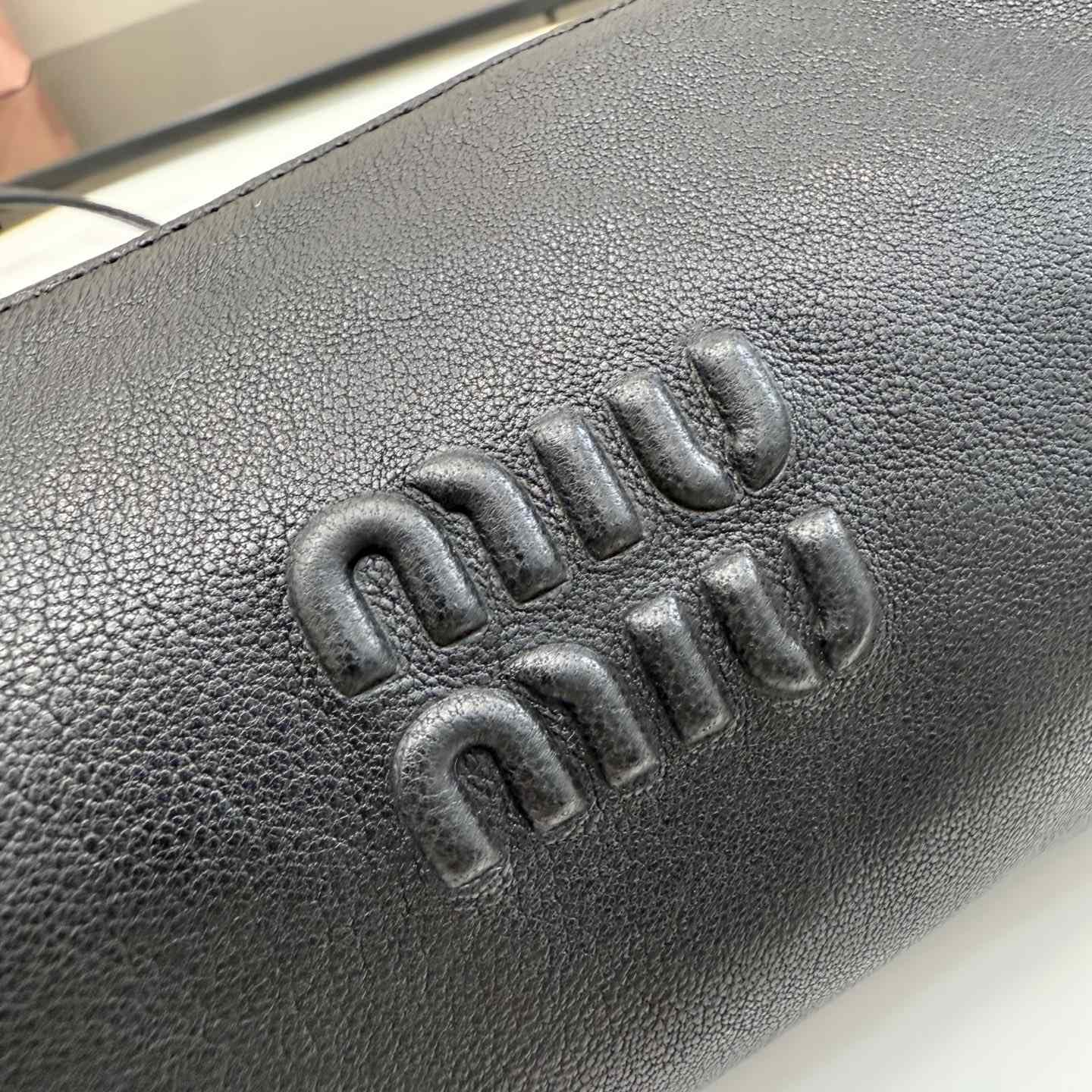 Miu Miu Nappa Leather Pouch - FashionPlug