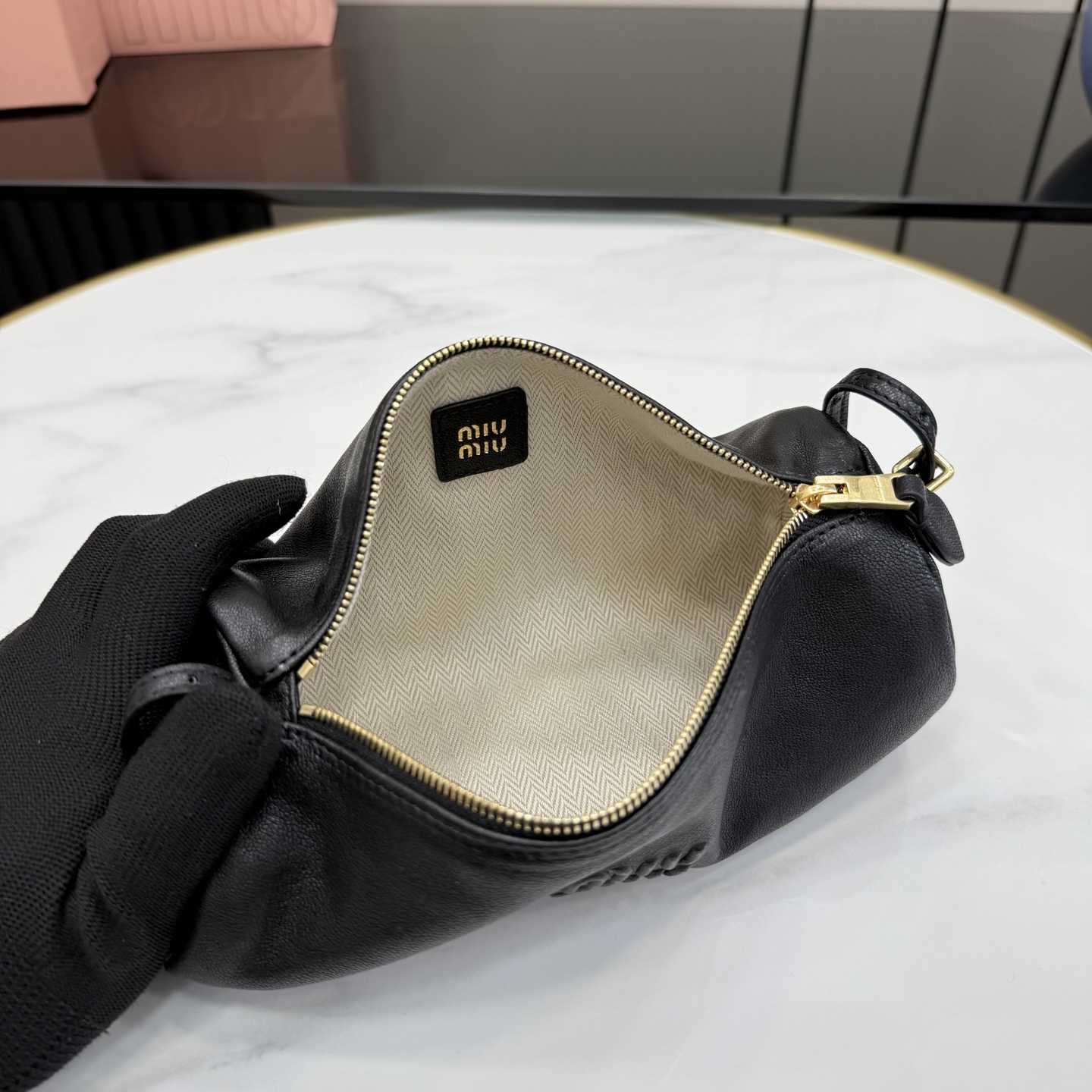 Miu Miu Nappa Leather Pouch - FashionPlug
