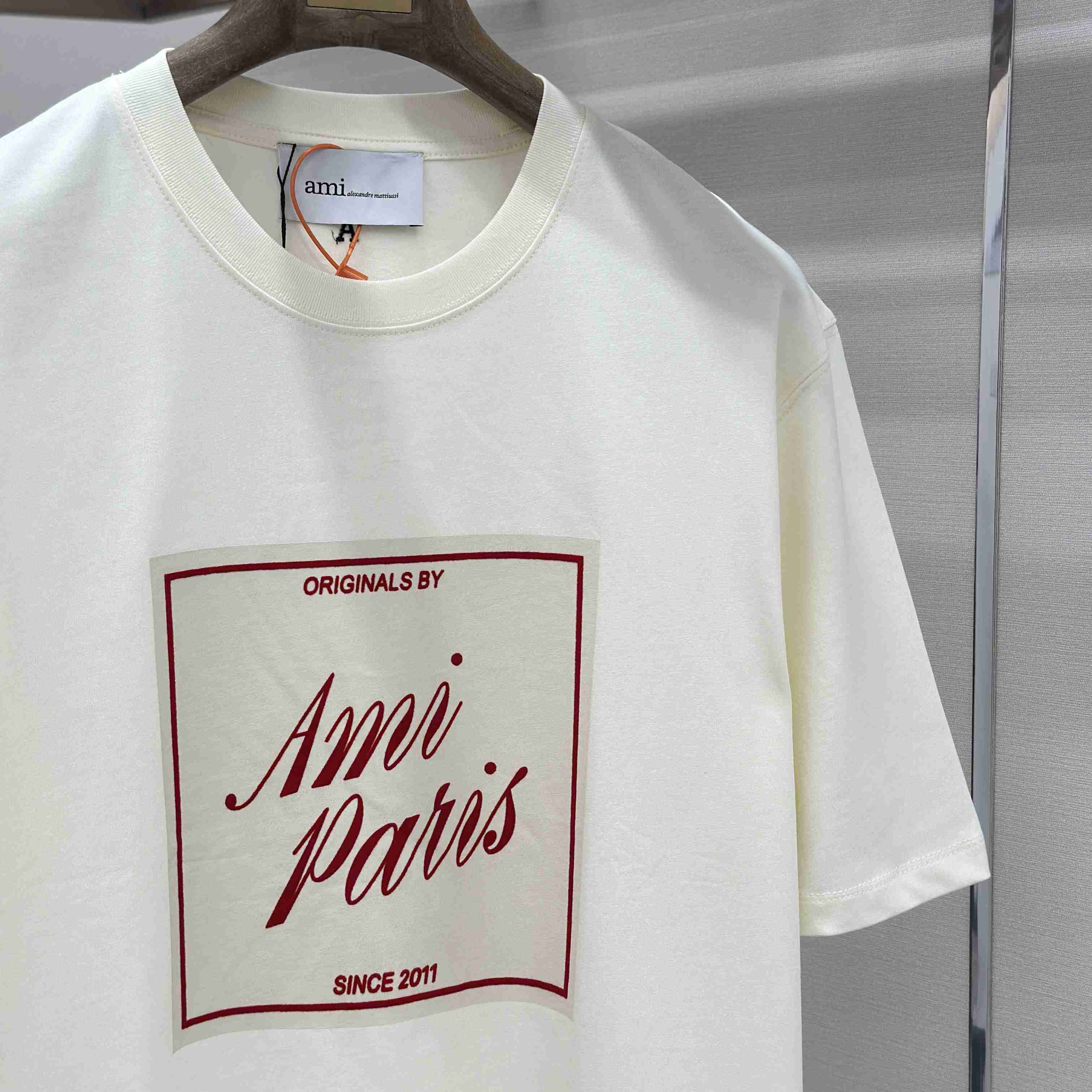 AMI Paris White Cotton Ami Paris Heritage Print T-shirt - FashionPlug