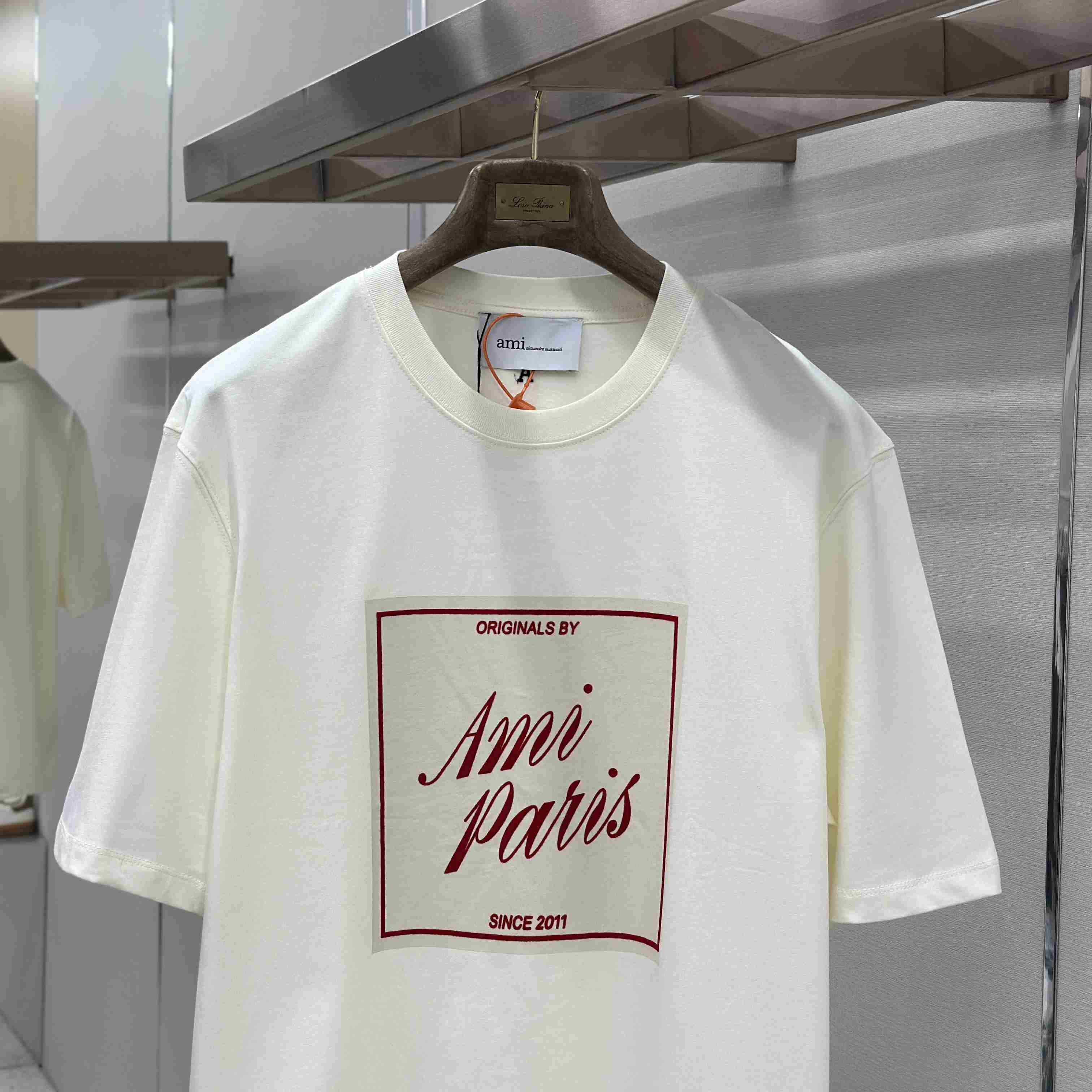 AMI Paris White Cotton Ami Paris Heritage Print T-shirt - FashionPlug