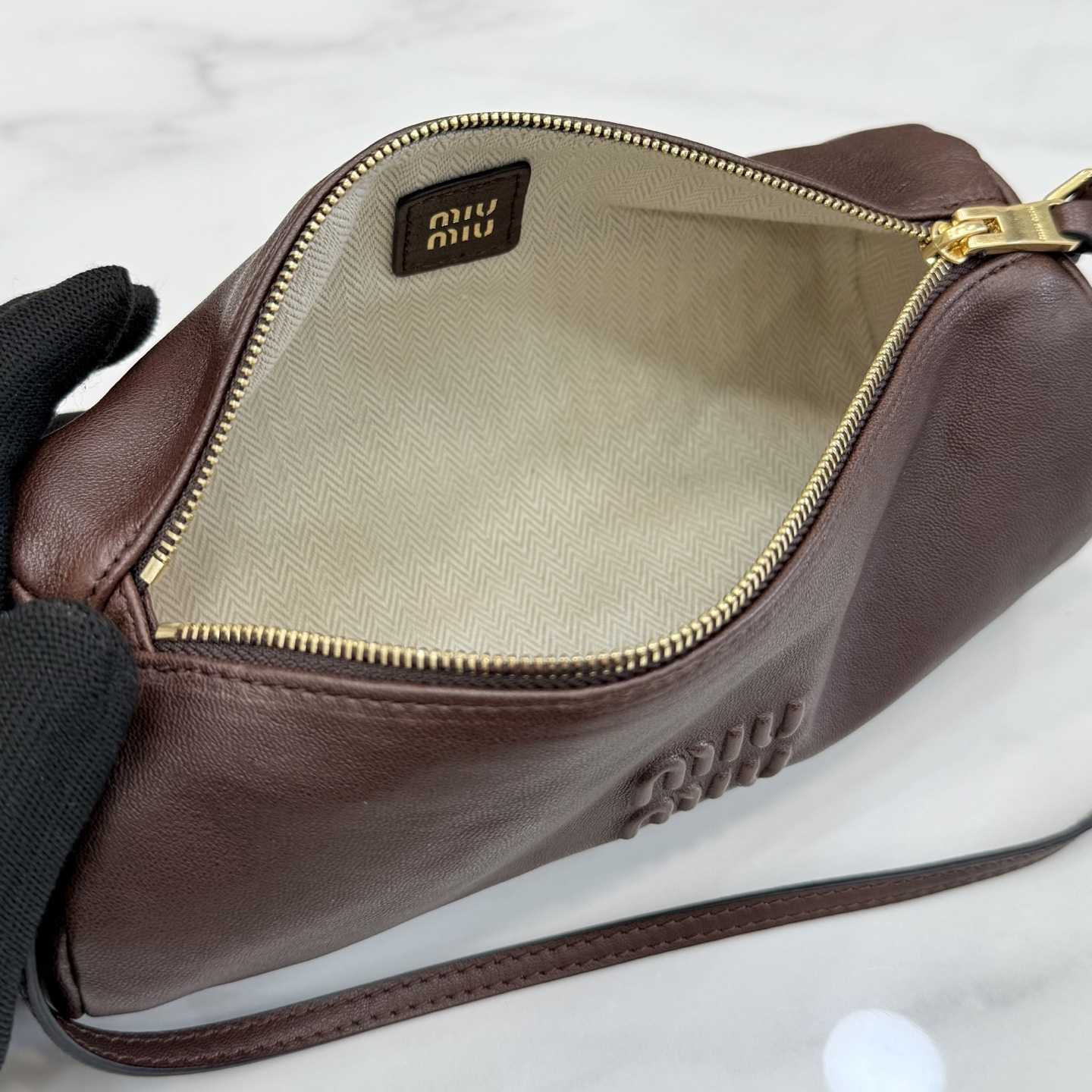 Miu Miu Nappa Leather Pouch - FashionPlug