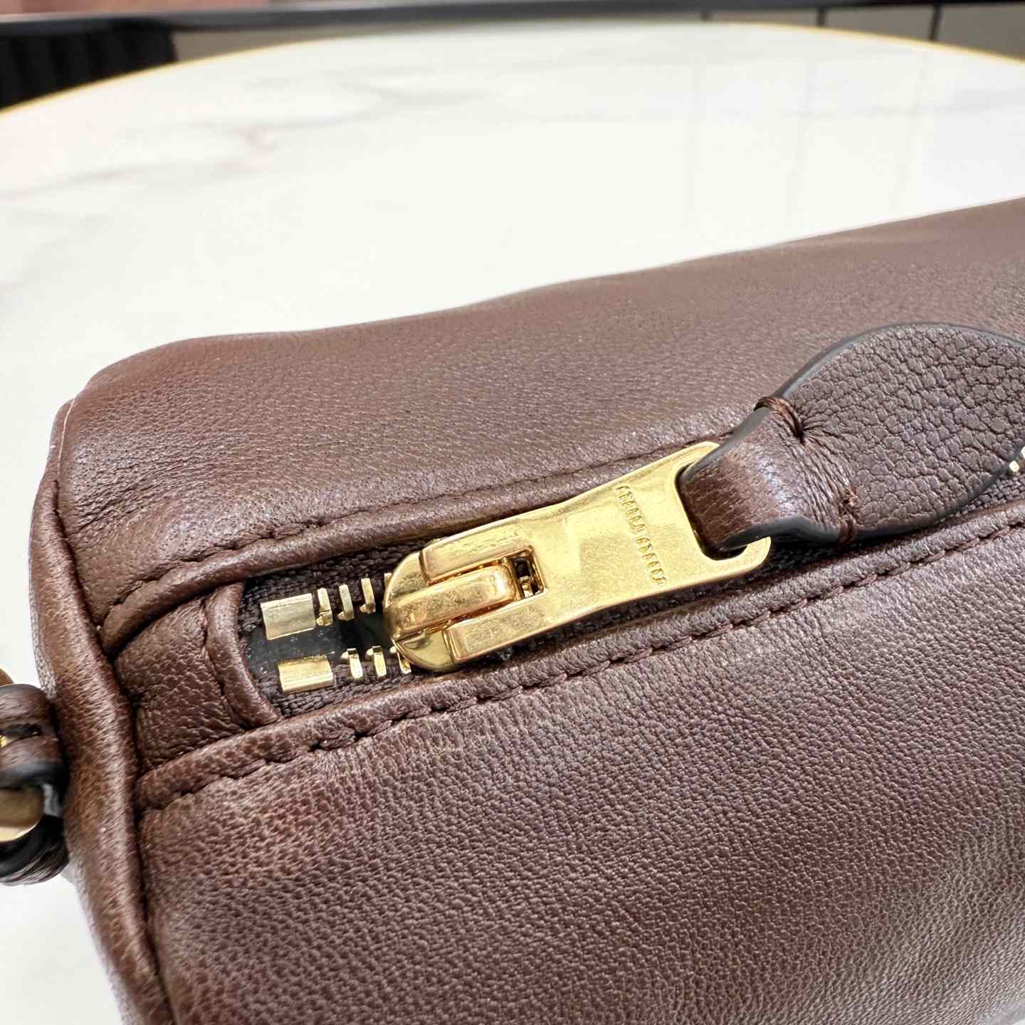 Miu Miu Nappa Leather Pouch - FashionPlug