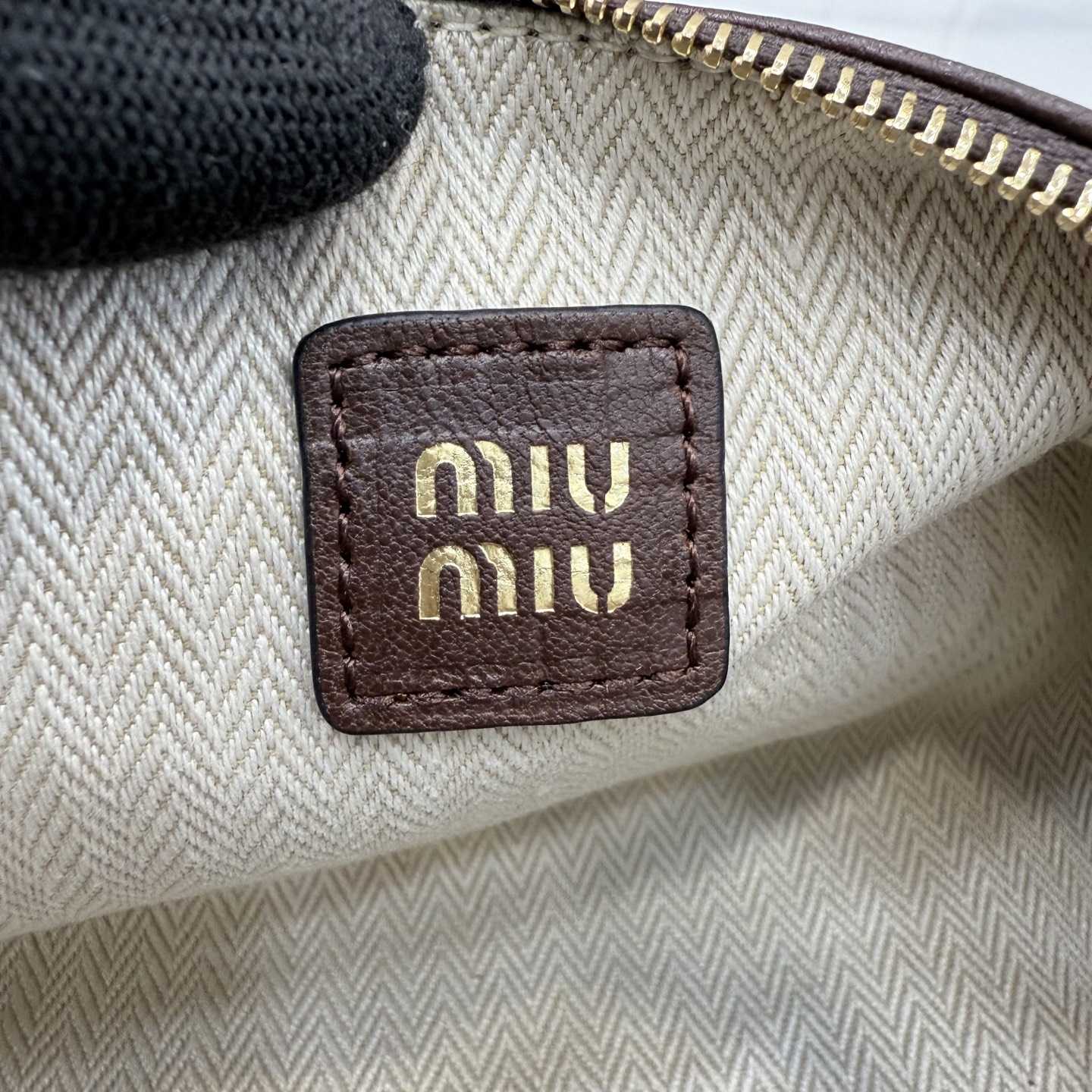 Miu Miu Nappa Leather Pouch - FashionPlug