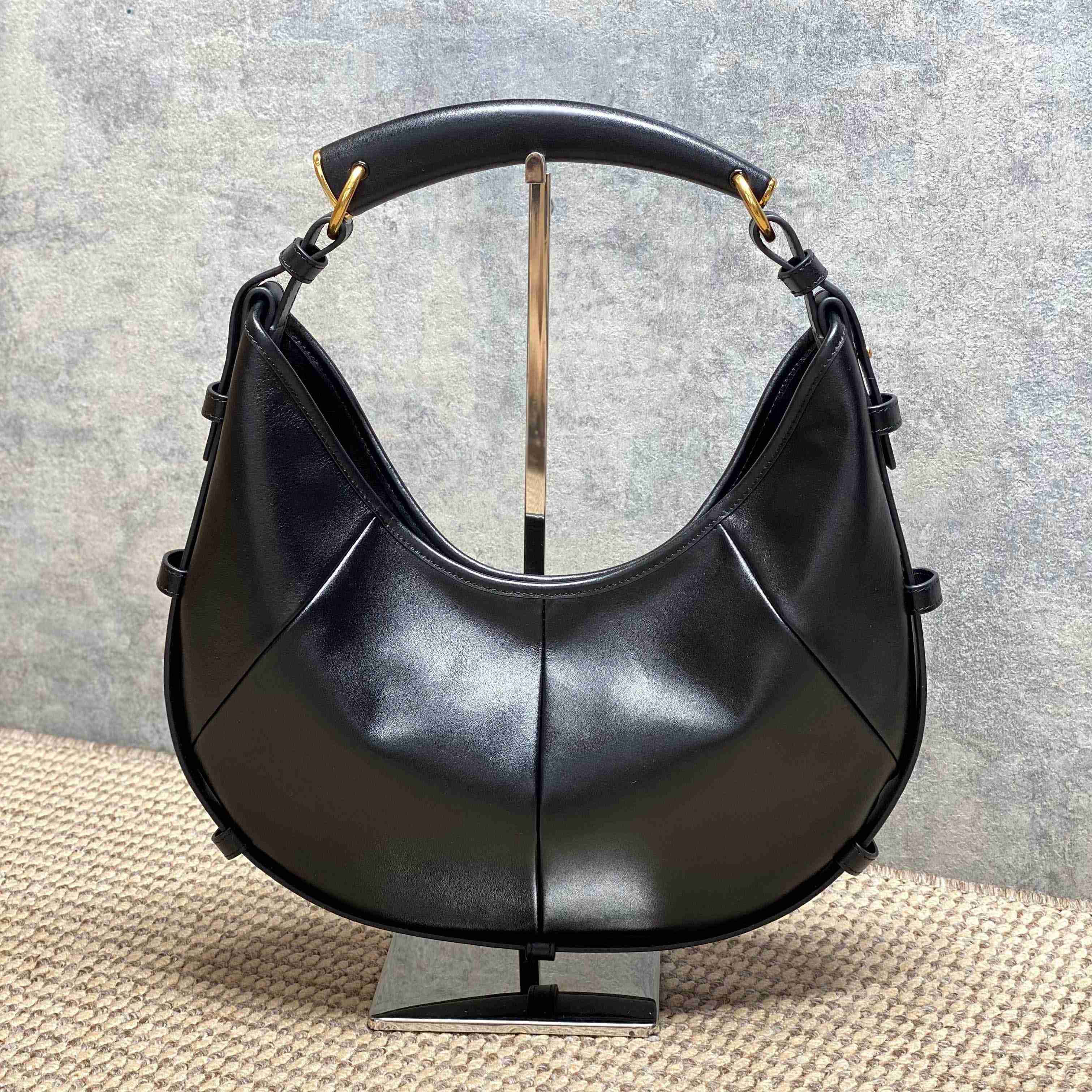 Saint Laurent MOMBASA Medium In Leather - FashionPlug