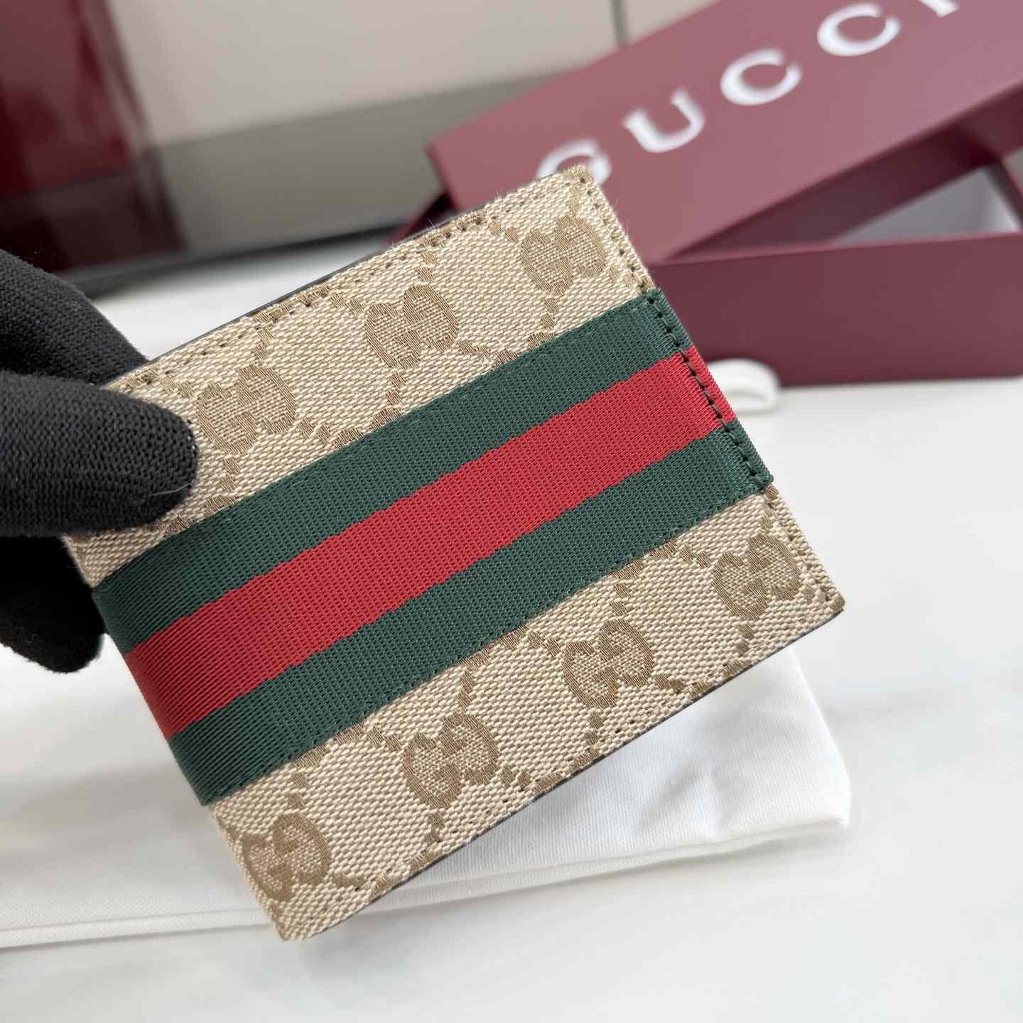 Gucci Bi-fold wallet With Web - FashionPlug