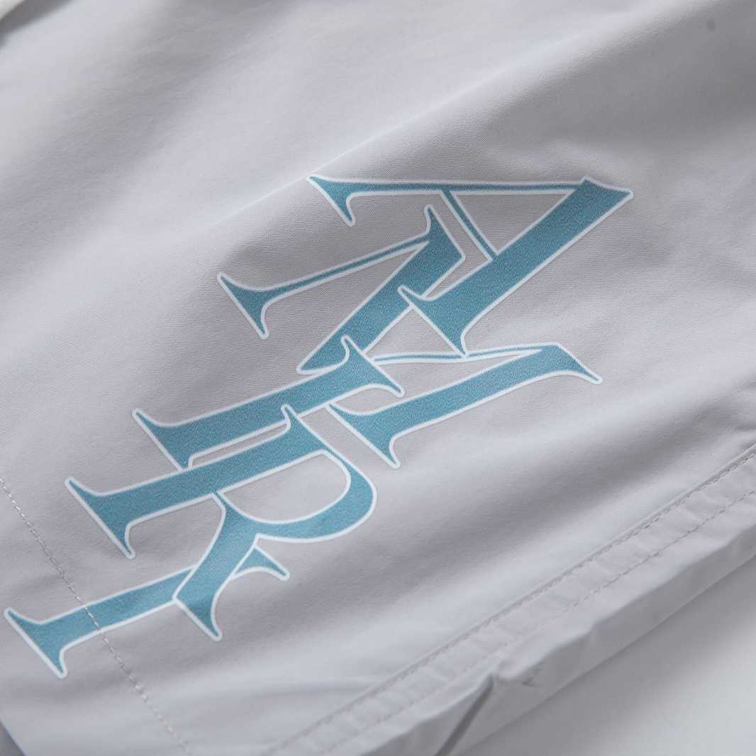 Amiri Stack Logo Swim Shorts In Stretch Limo - FashionPlug
