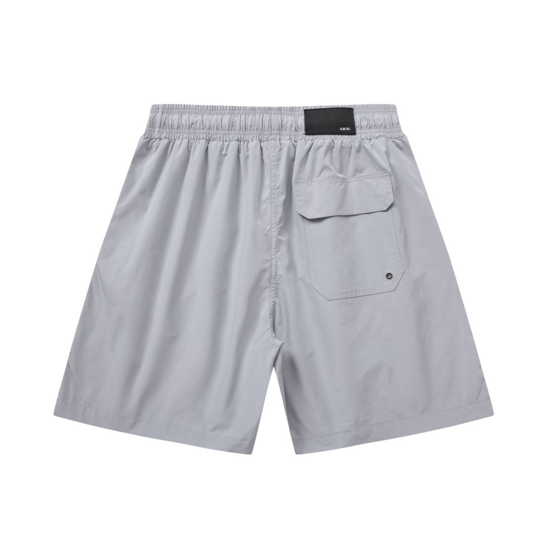 Amiri Stack Logo Swim Shorts In Stretch Limo - FashionPlug
