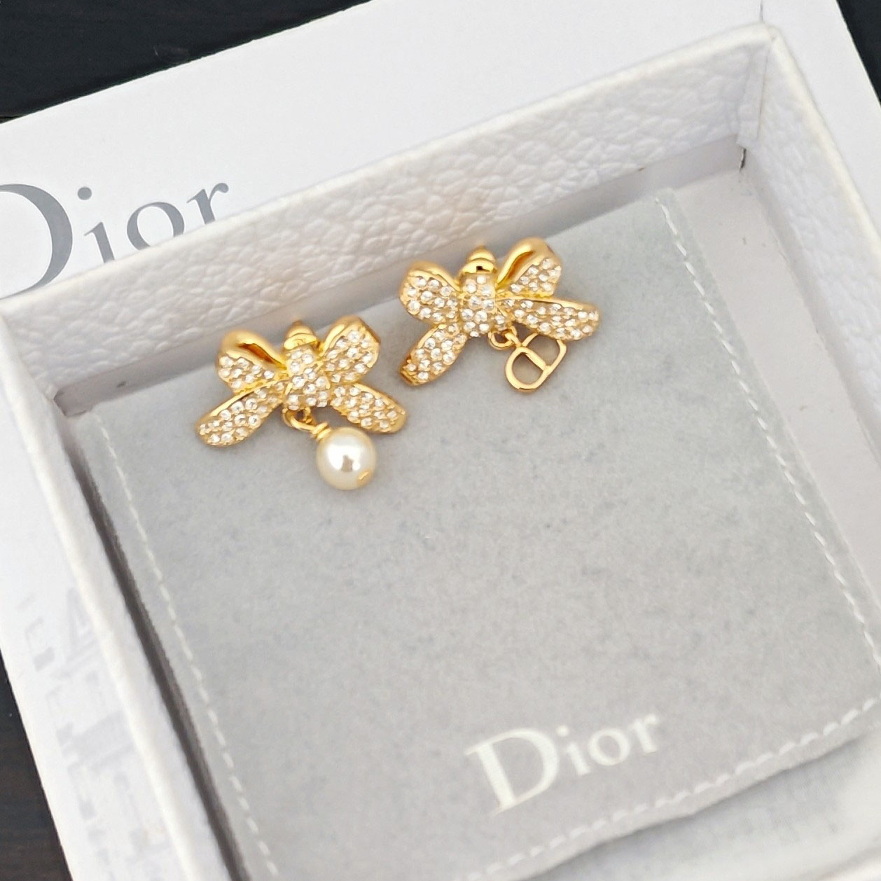 Dior Delicate Bow Earrings - FashionPlug