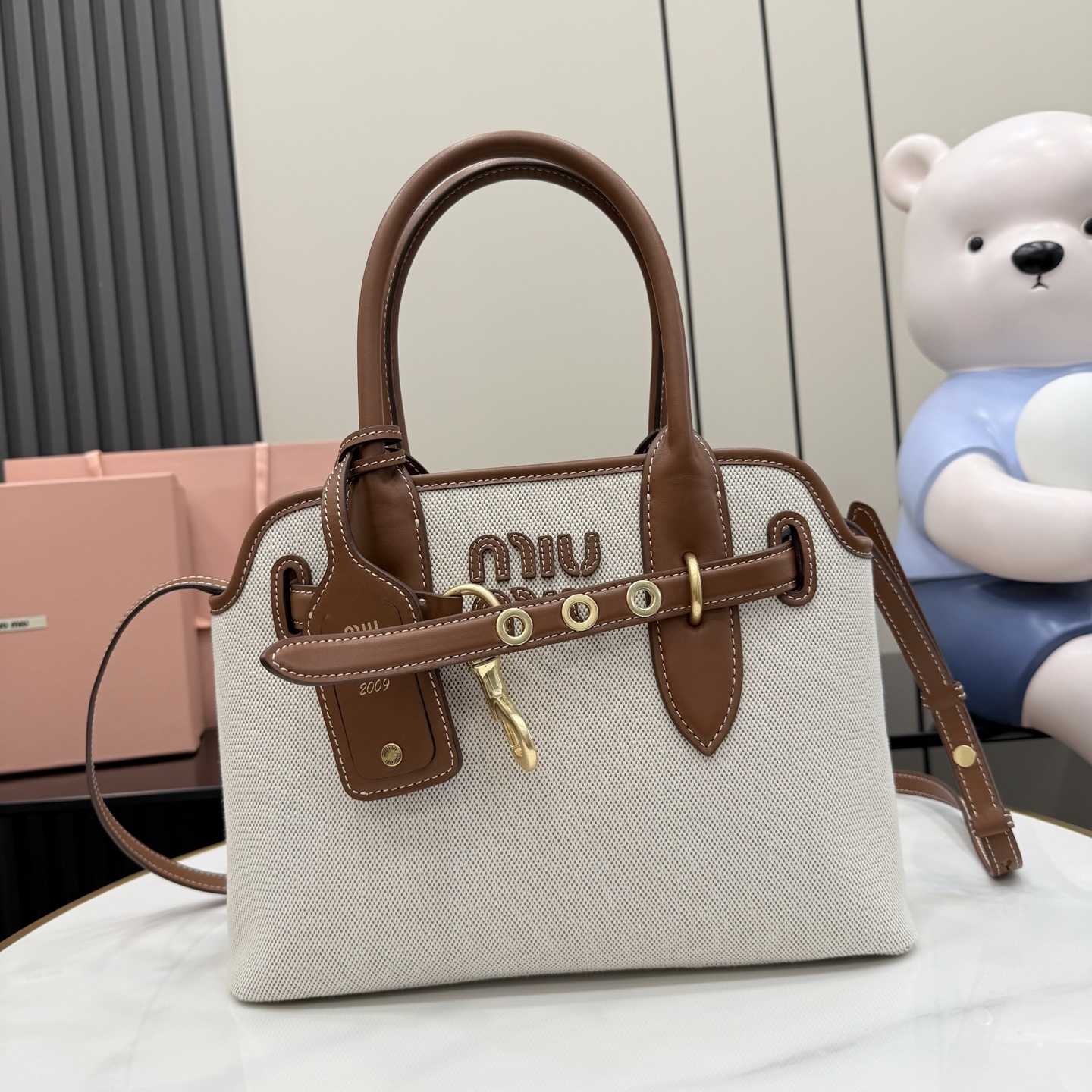 Miu Miu Aventure Canvas And Leather Bag - FashionPlug