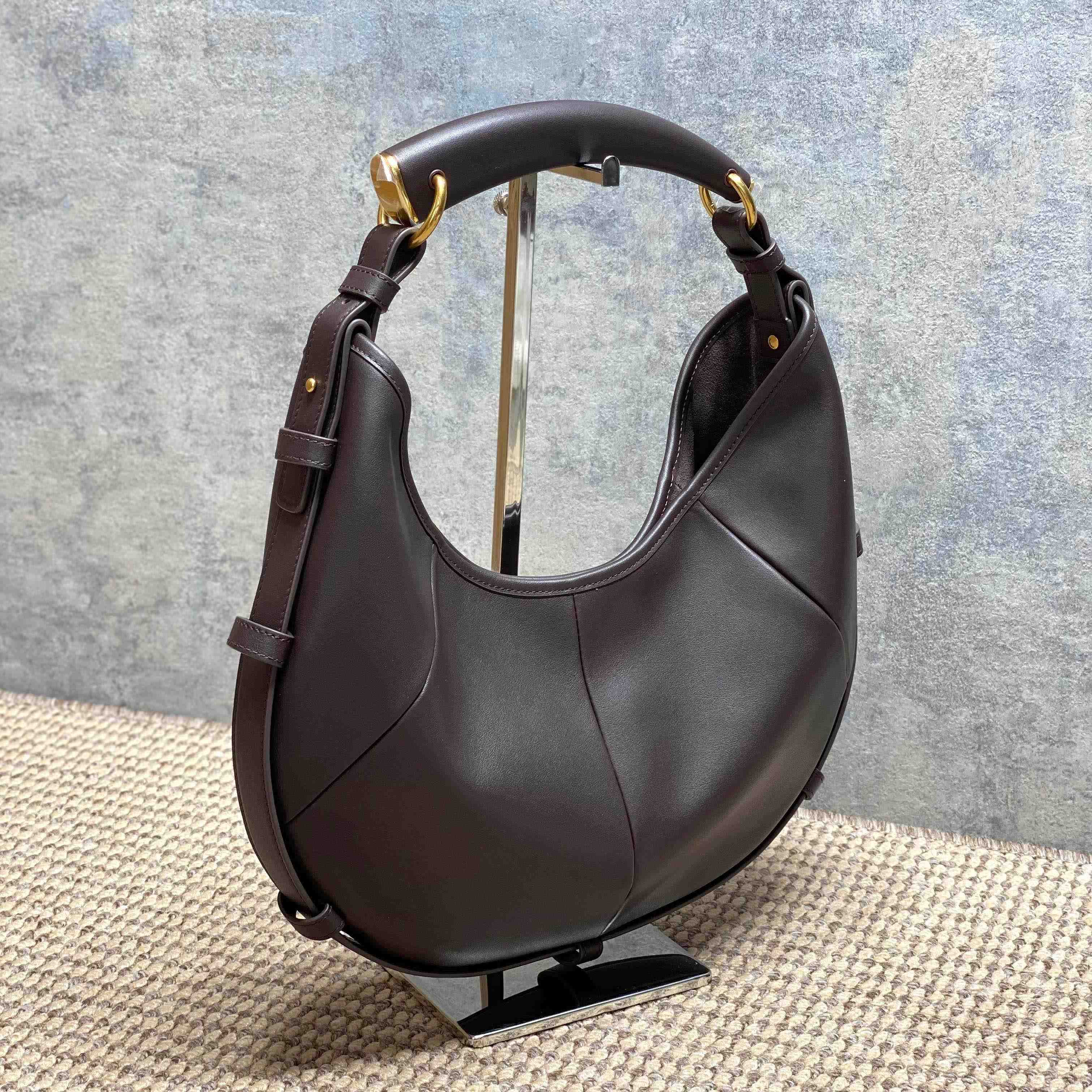 Saint Laurent MOMBASA Small In Leather - FashionPlug