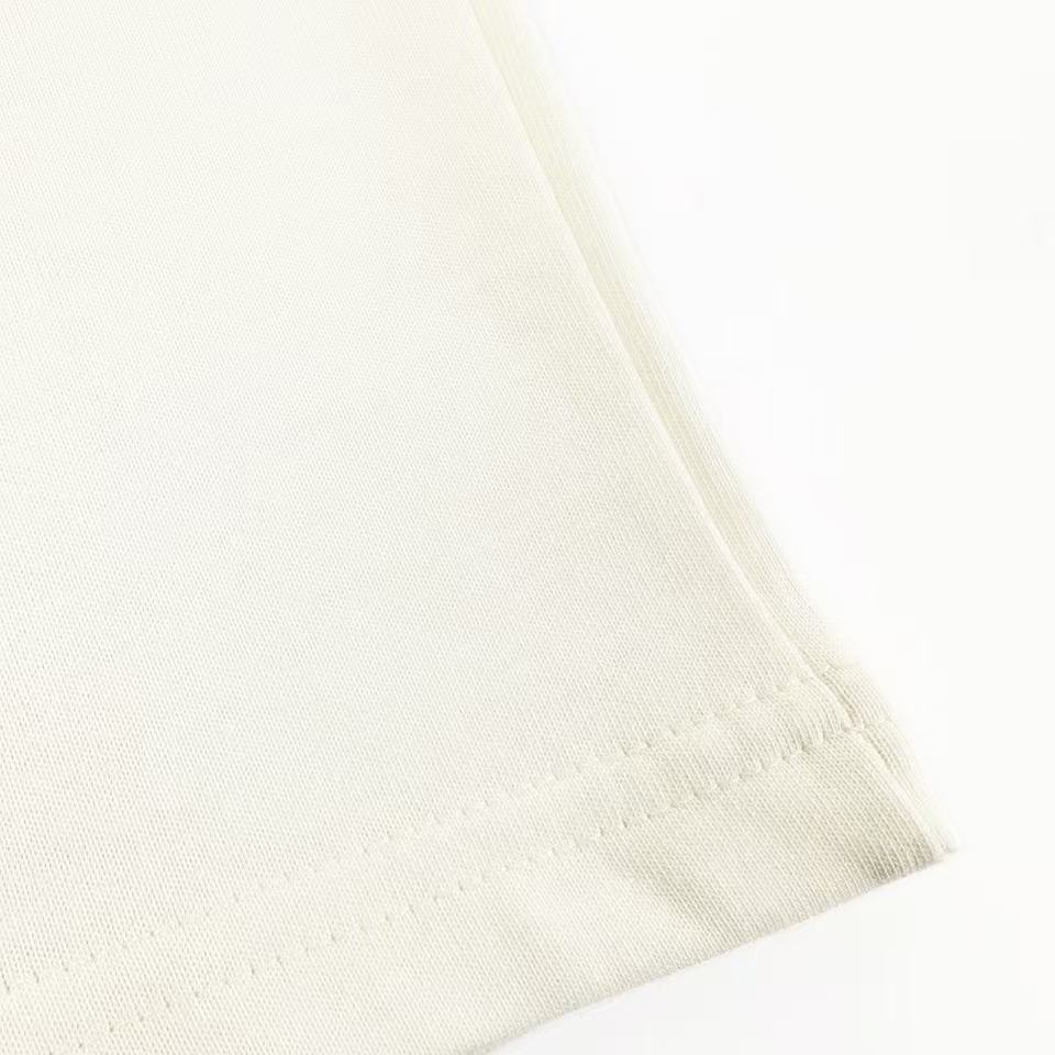 AMI Paris White And Black Cotton Ami De Coeur Knitted Patch T-shirt - FashionPlug