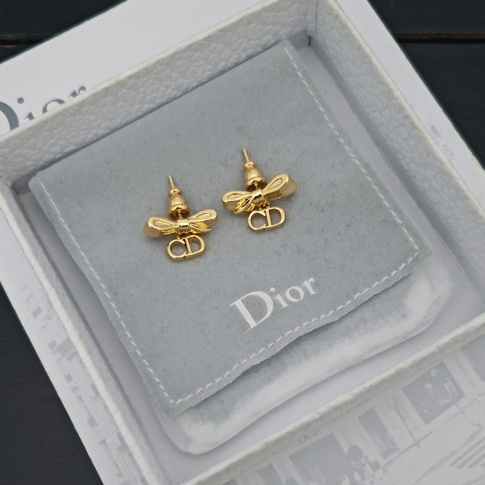 Dior CD Bow Earrings - FashionPlug
