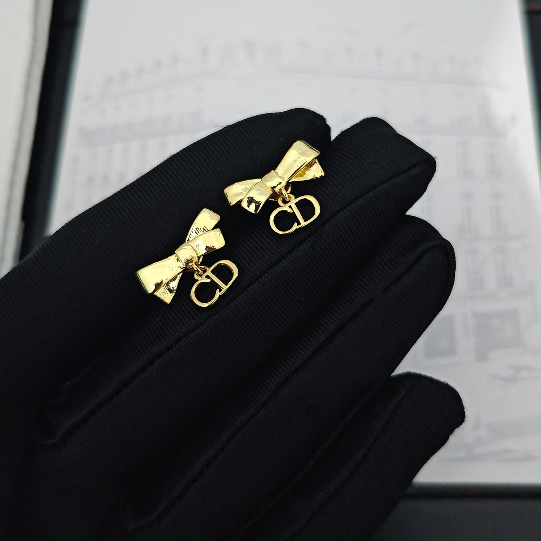 Dior CD Bow Earrings - FashionPlug
