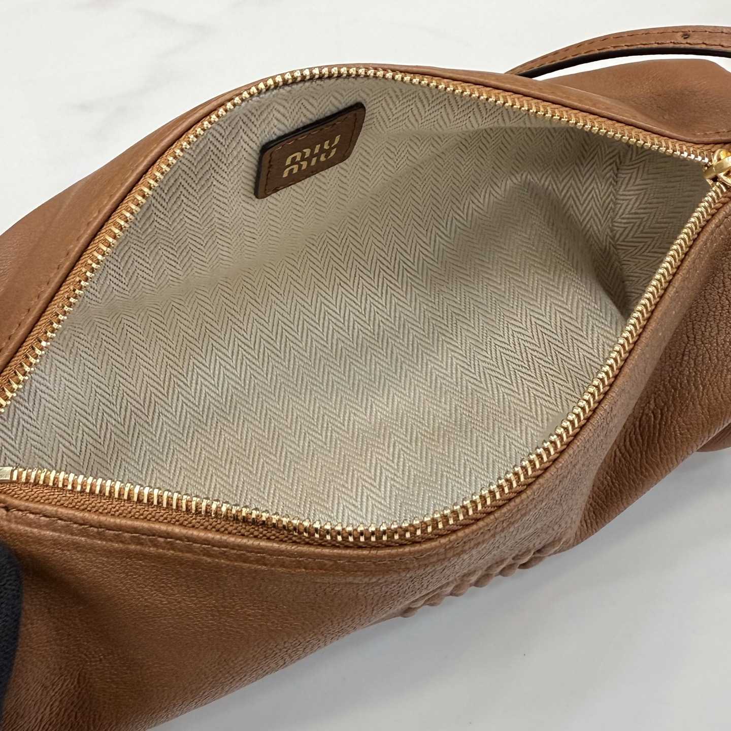 Miu Miu Nappa Leather Pouch - FashionPlug