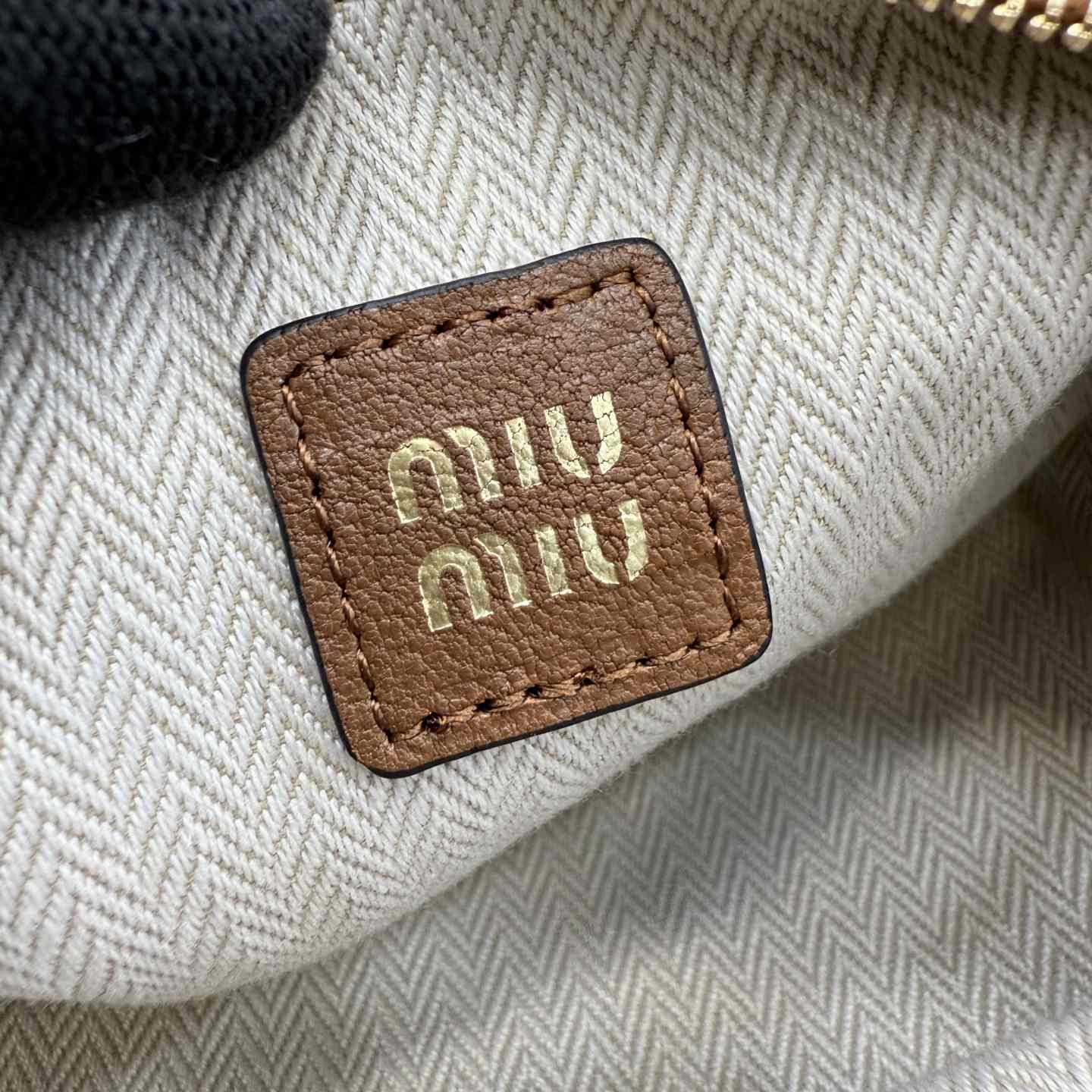 Miu Miu Nappa Leather Pouch - FashionPlug