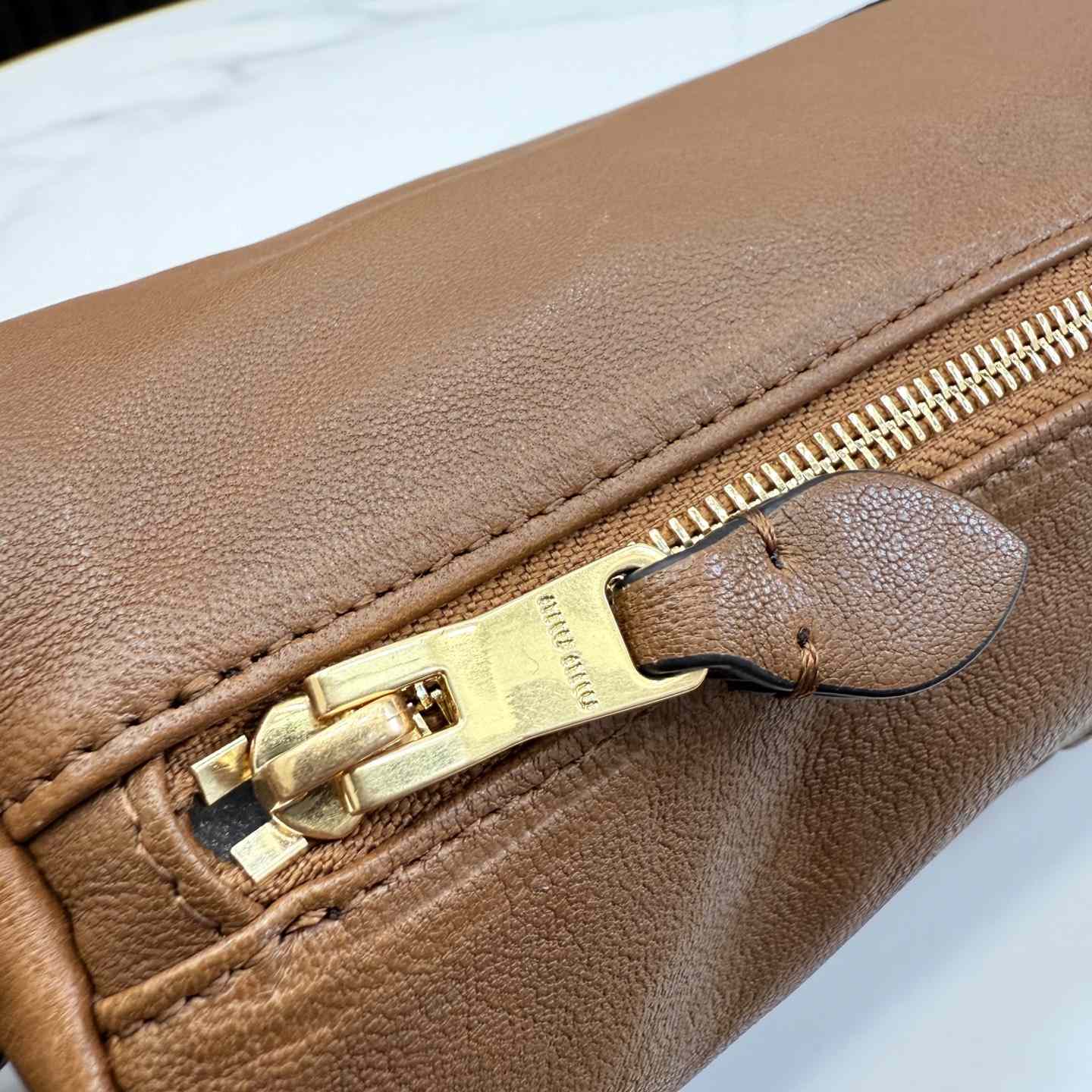 Miu Miu Nappa Leather Pouch - FashionPlug