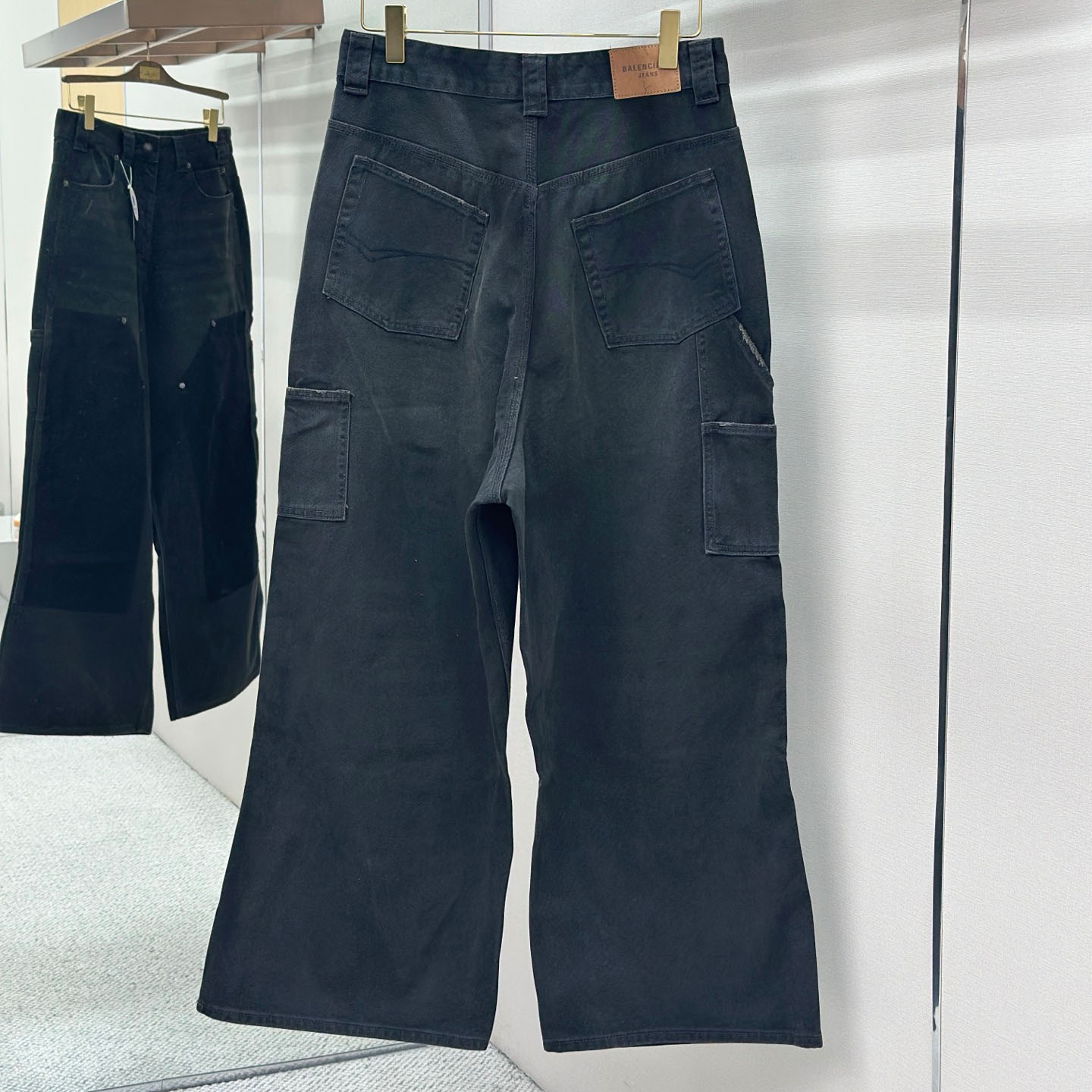 Balenciaga Ripped Off Baggy Jeans - FashionPlug
