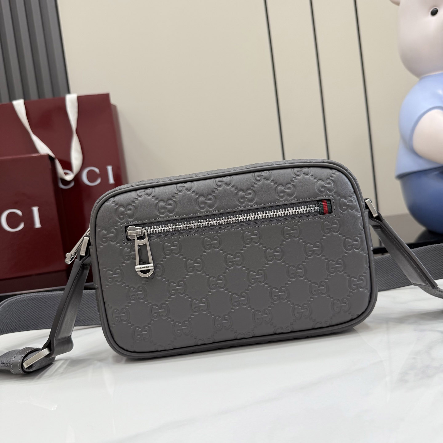Gucci GG Emblem Small Crossbody Bag 850242 - FashionPlug