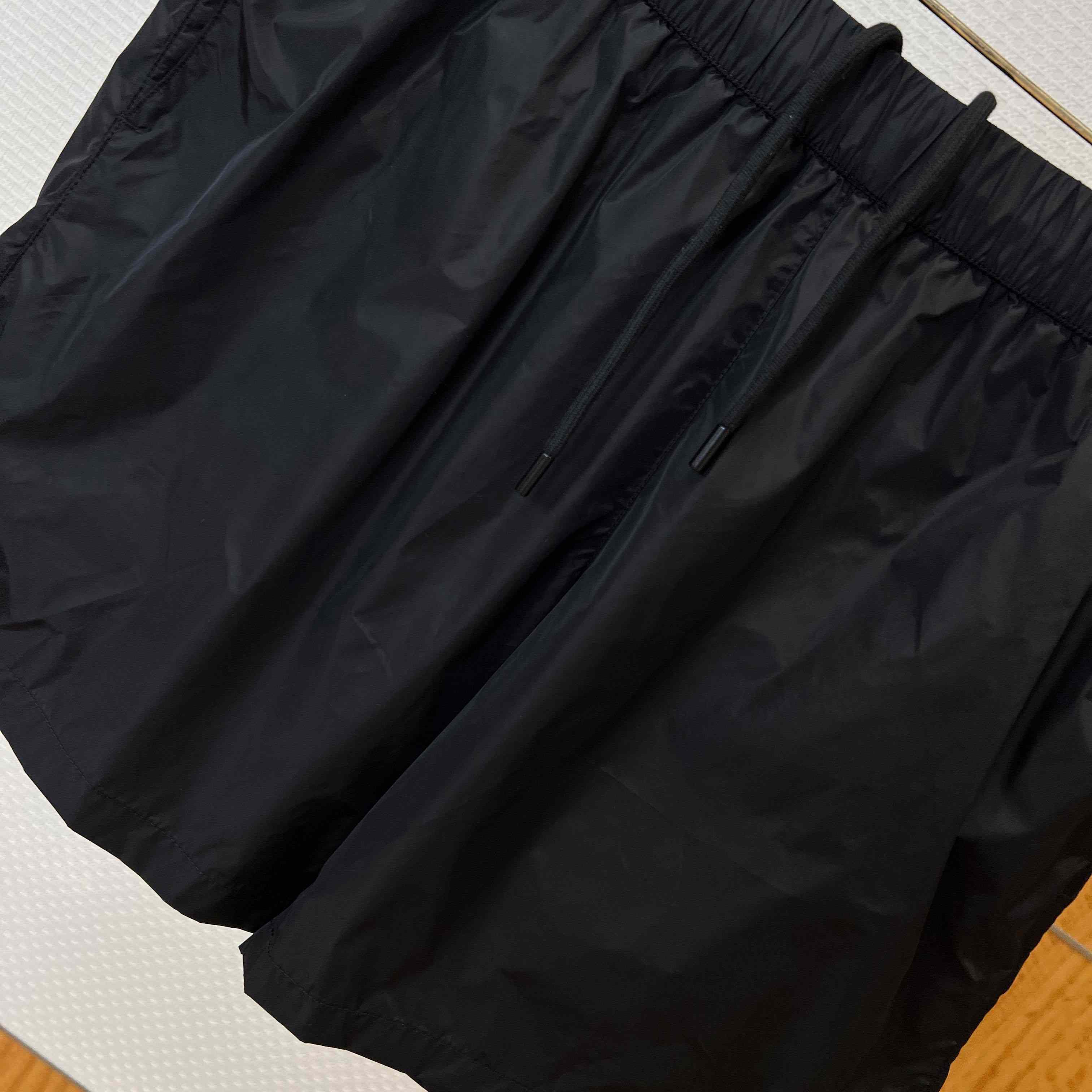Prada Re-Nylon Swim Trunks - FashionPlug
