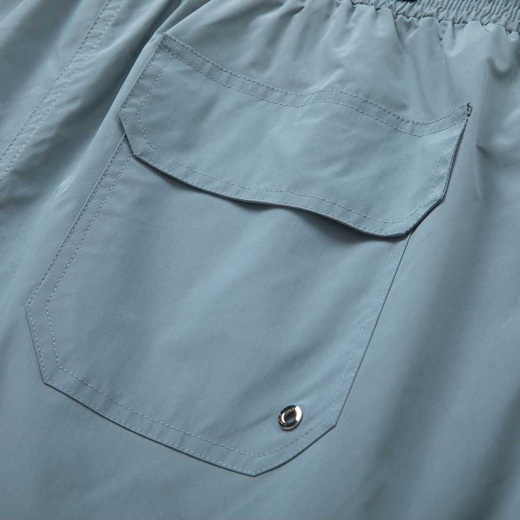 Amiri Core Logo Swim Shorts Dusty Blue - FashionPlug