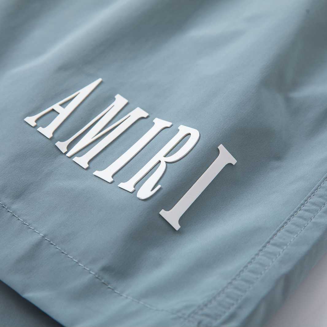 Amiri Core Logo Swim Shorts Dusty Blue - FashionPlug
