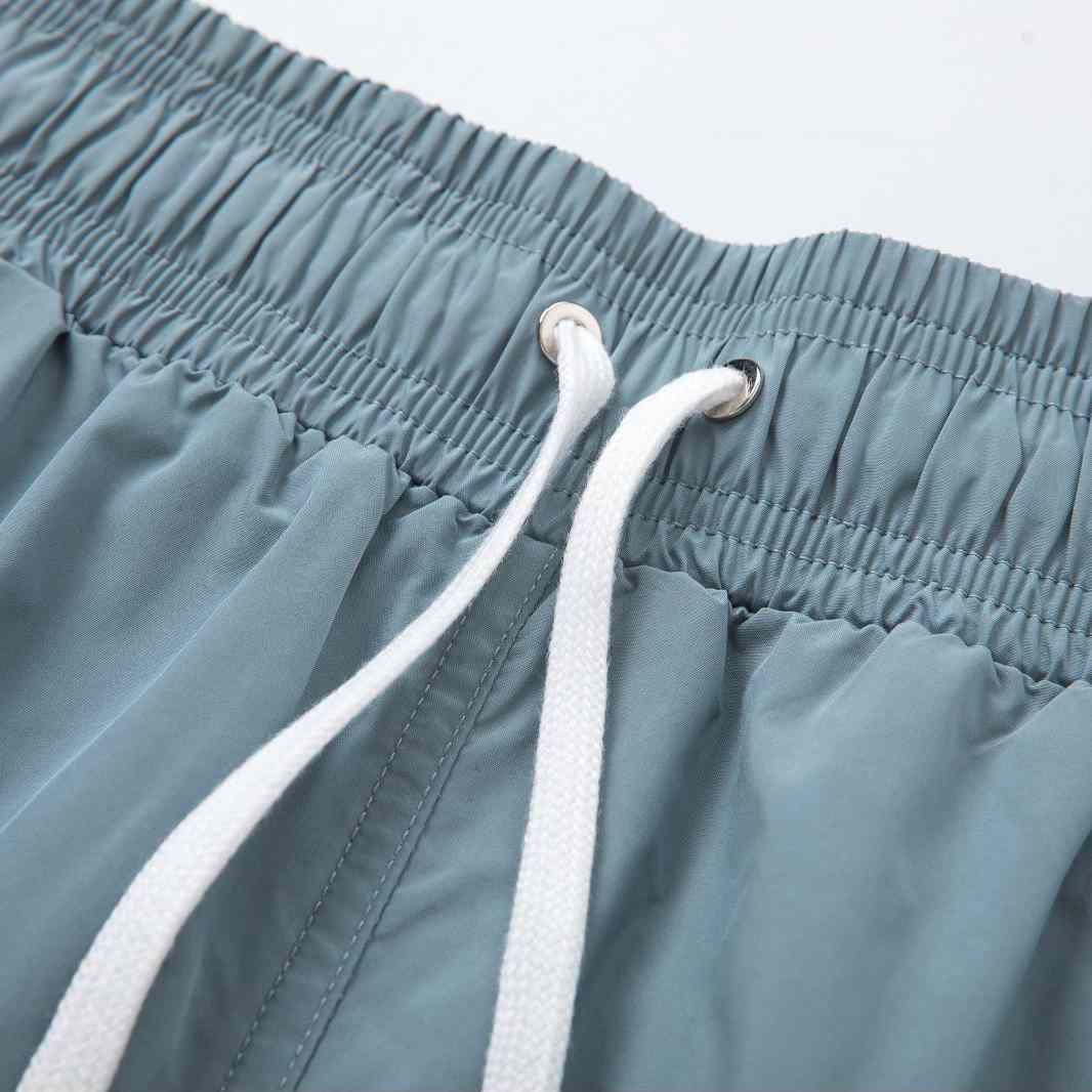Amiri Core Logo Swim Shorts Dusty Blue - FashionPlug