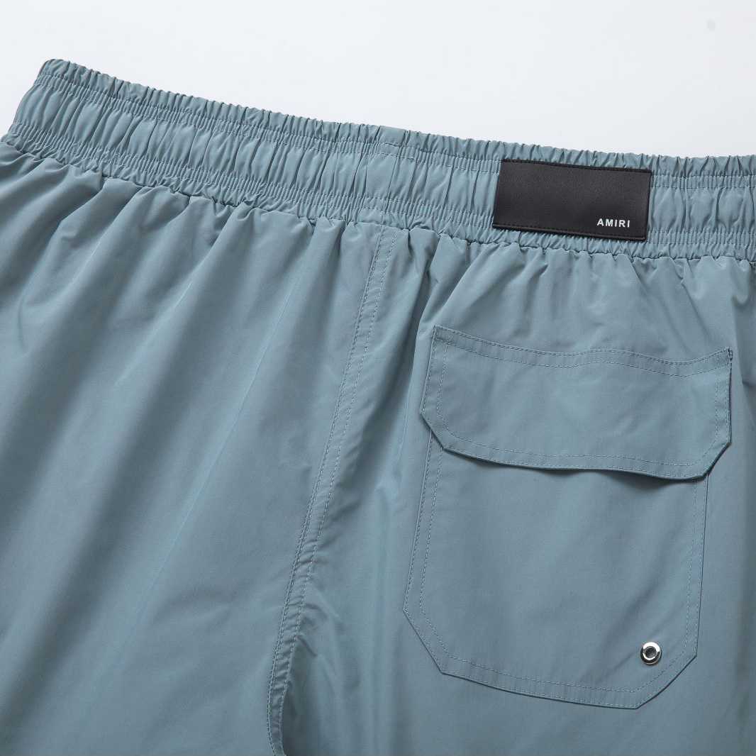 Amiri Core Logo Swim Shorts Dusty Blue - FashionPlug