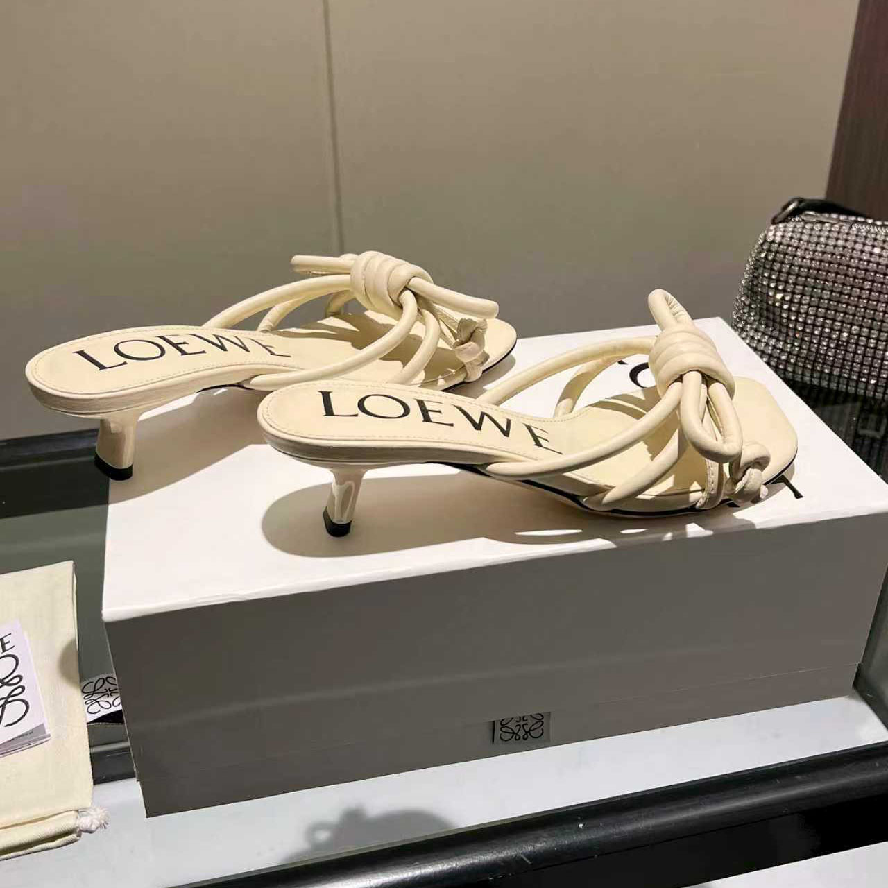 Loewe Flamenco Knot Sandal In Lambskin - FashionPlug