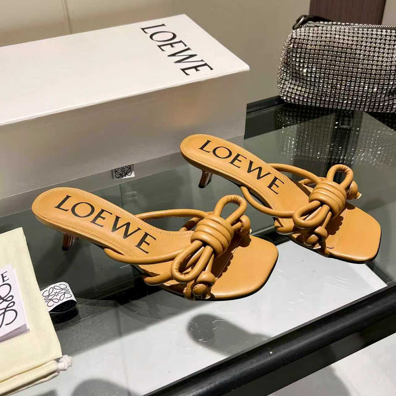 Loewe Flamenco Knot Sandal In Lambskin - FashionPlug