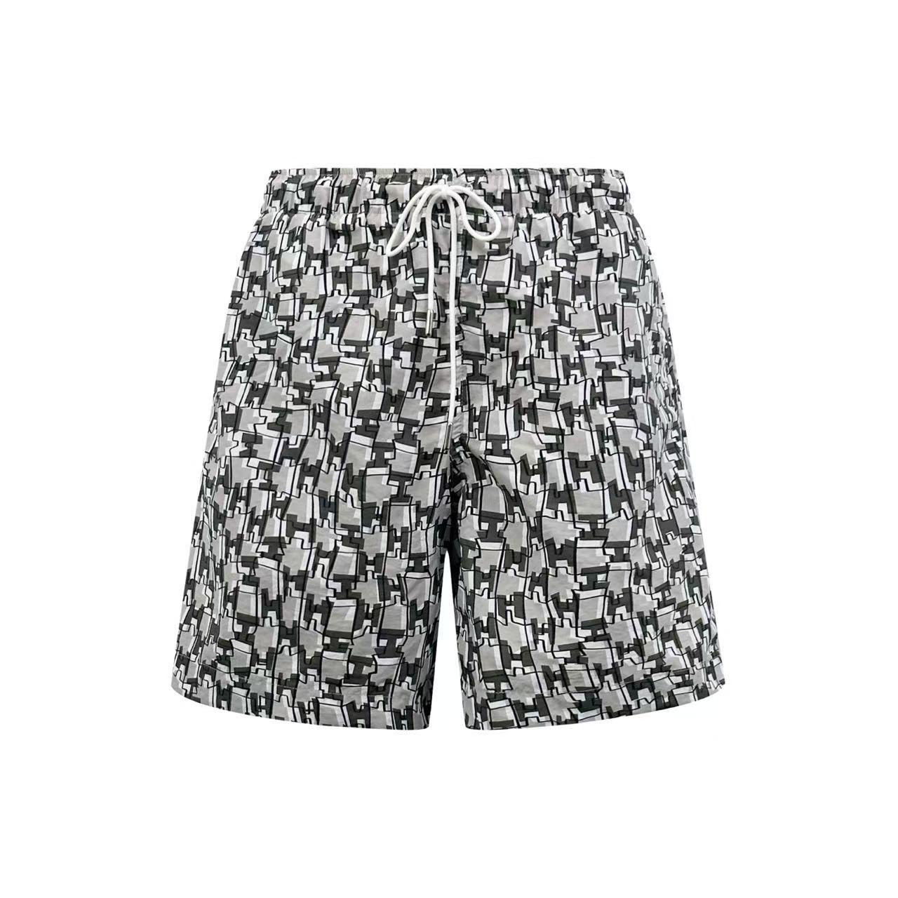 Hermes "H Cut Remix" Swim Trunks - FashionPlug