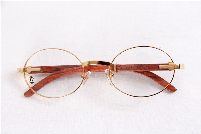 Cartier  51551348 Wood Eyeglasses In Gold - FashionPlug