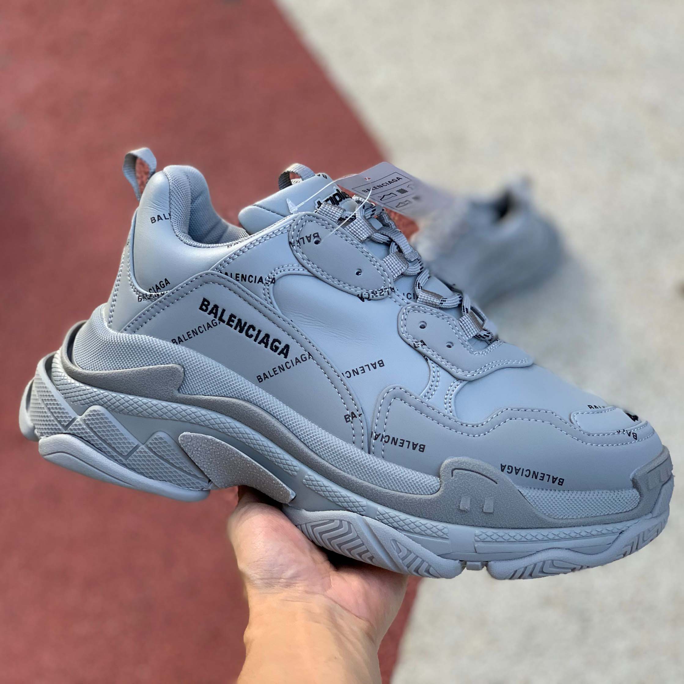 Balenciaga Allover Logo Triple S Sneaker - FashionPlug