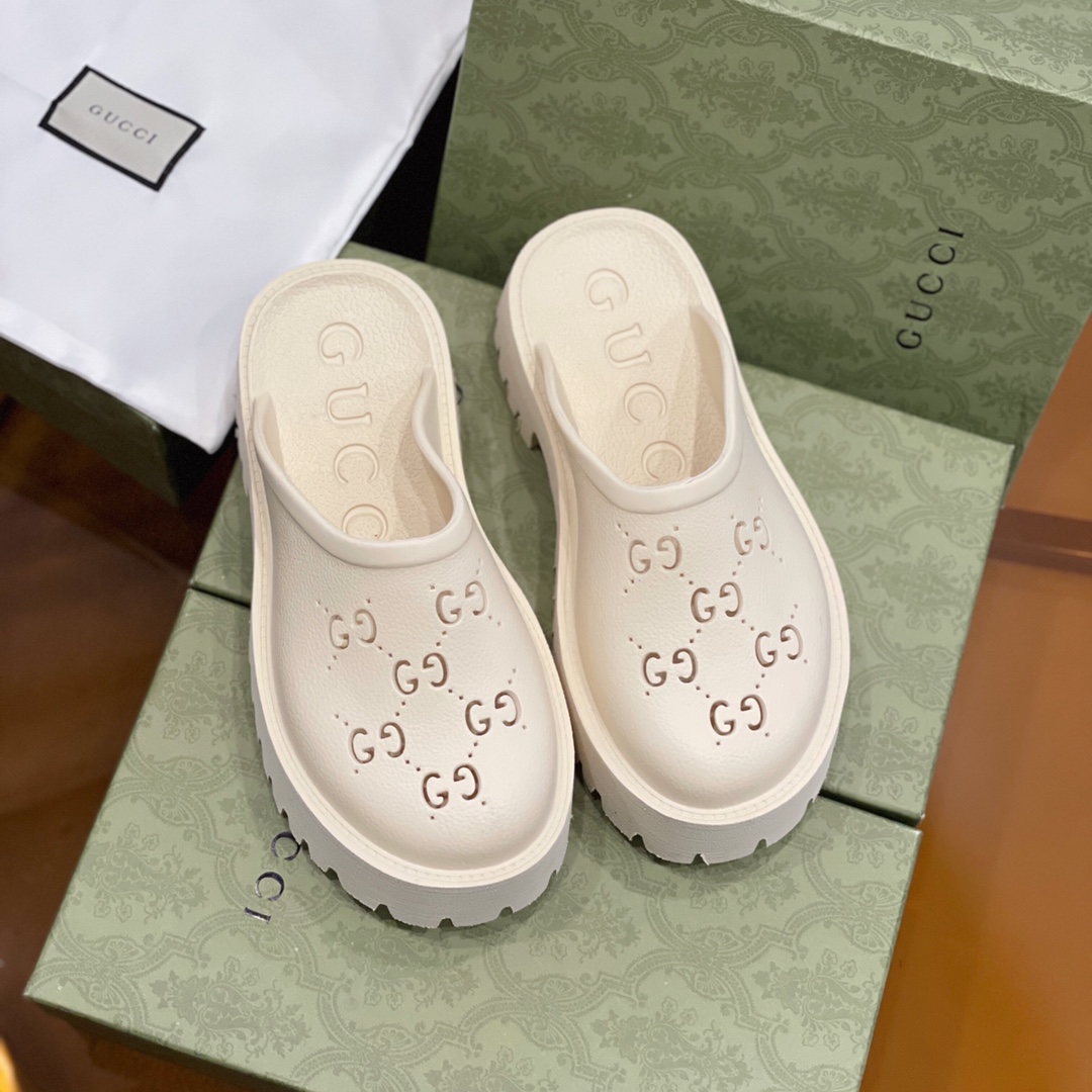 Gucci GG Slides - FashionPlug