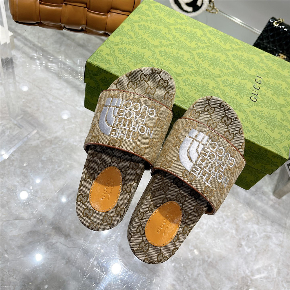 Gucci X The North Face GG Logo Slides - FashionPlug
