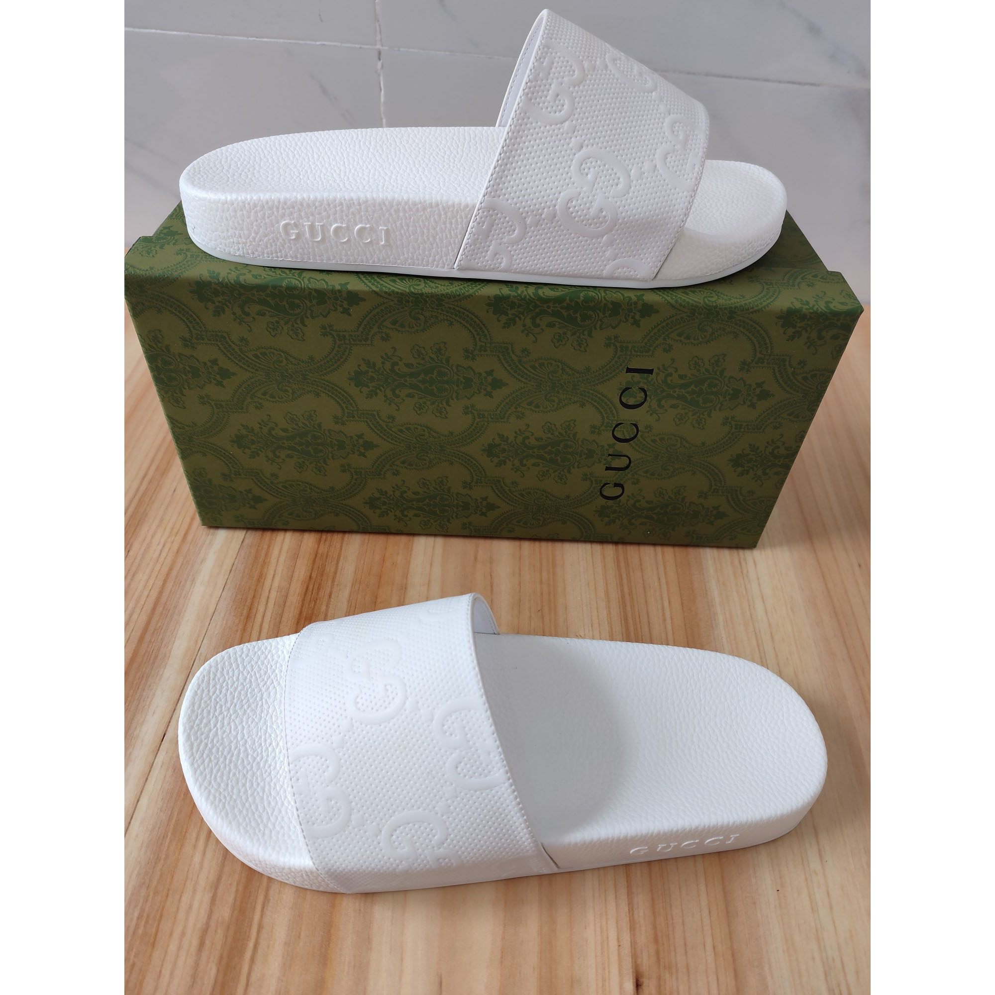 Gucci Logo Rubber Slide Sandal In White - FashionPlug