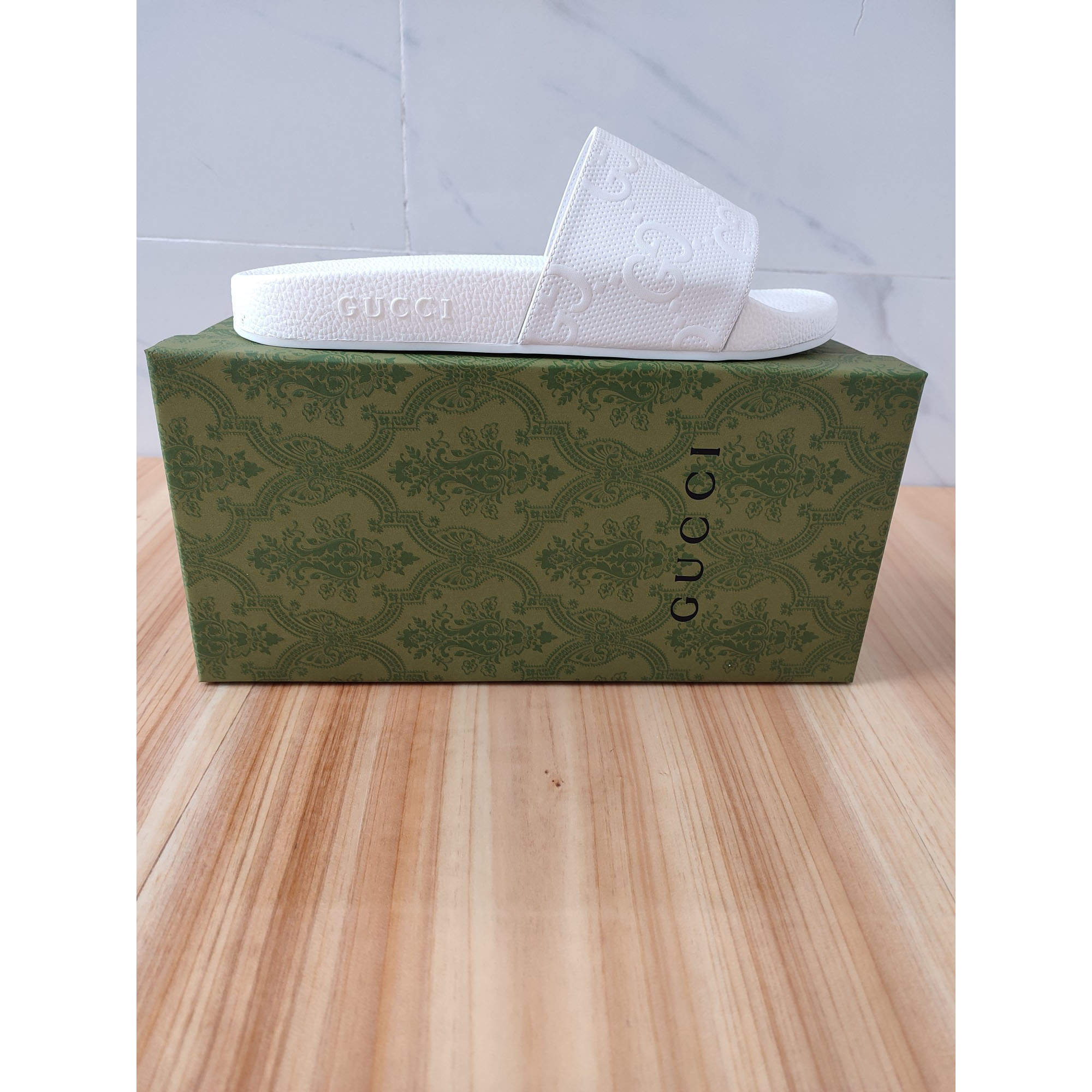 Gucci Logo Rubber Slide Sandal In White - FashionPlug