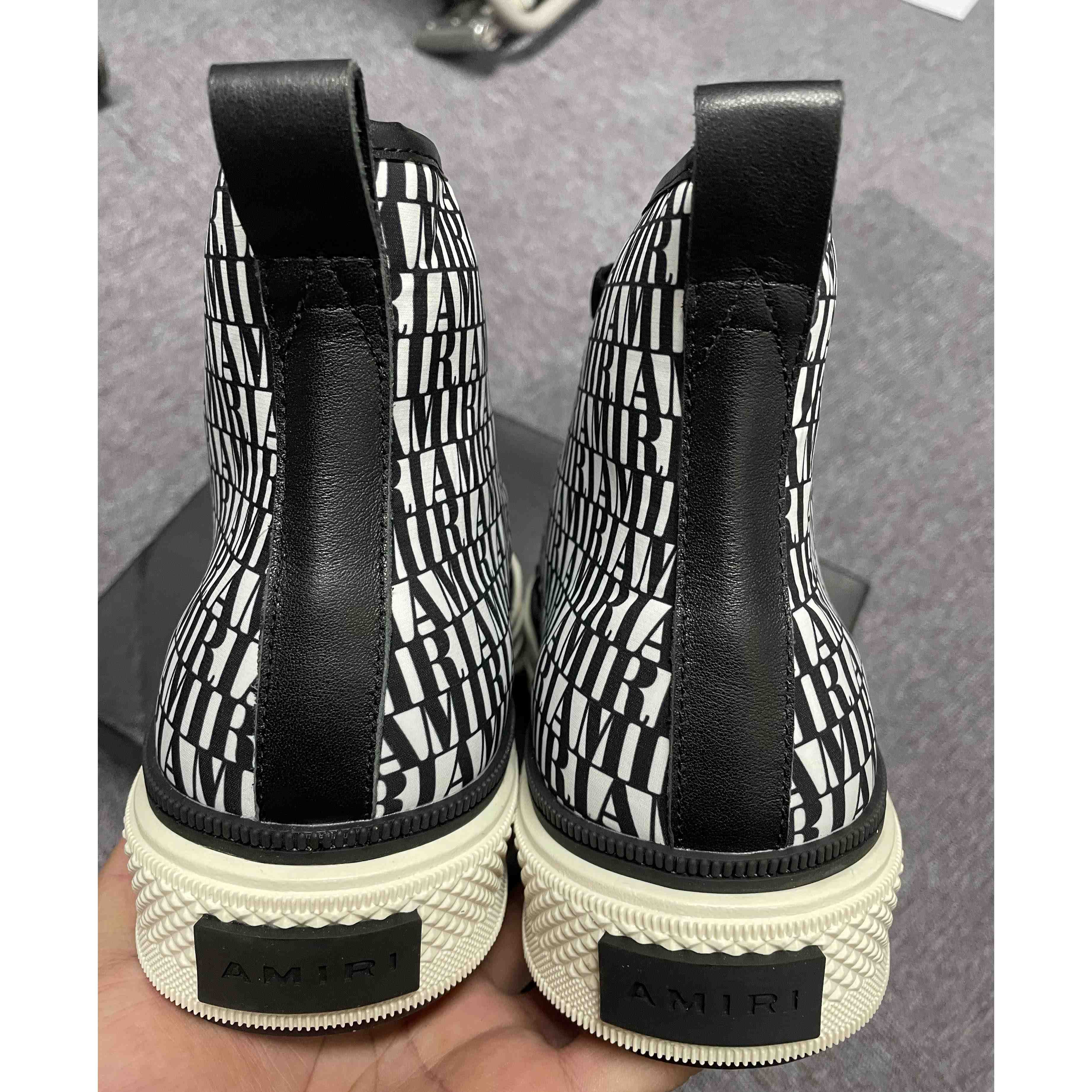Amiri Logo-Print Canvas High-Top Sneakers - FashionPlug