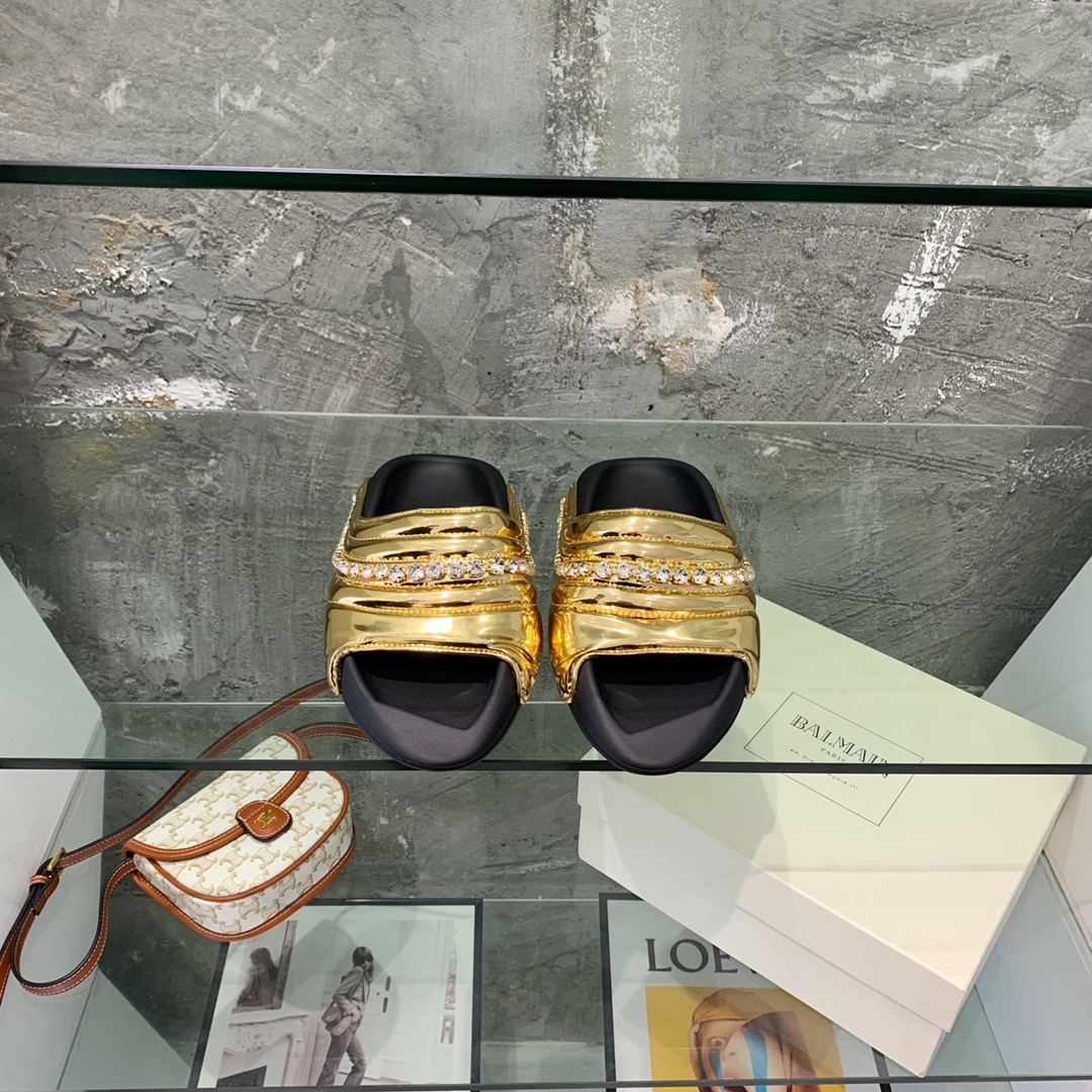 Balmain B-It-Puffy Slides - FashionPlug