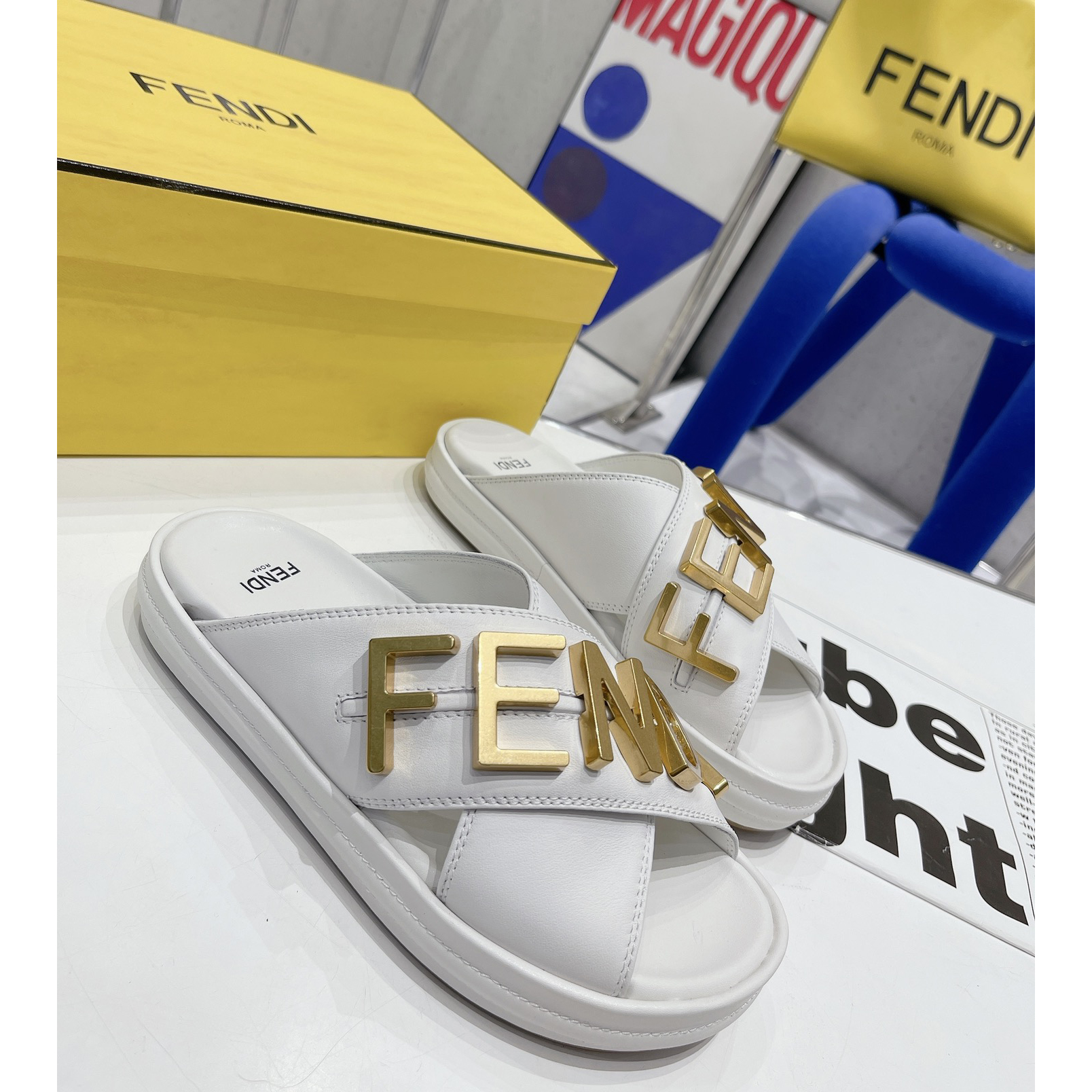 Fendi Graphy White Leather Slides - FashionPlug