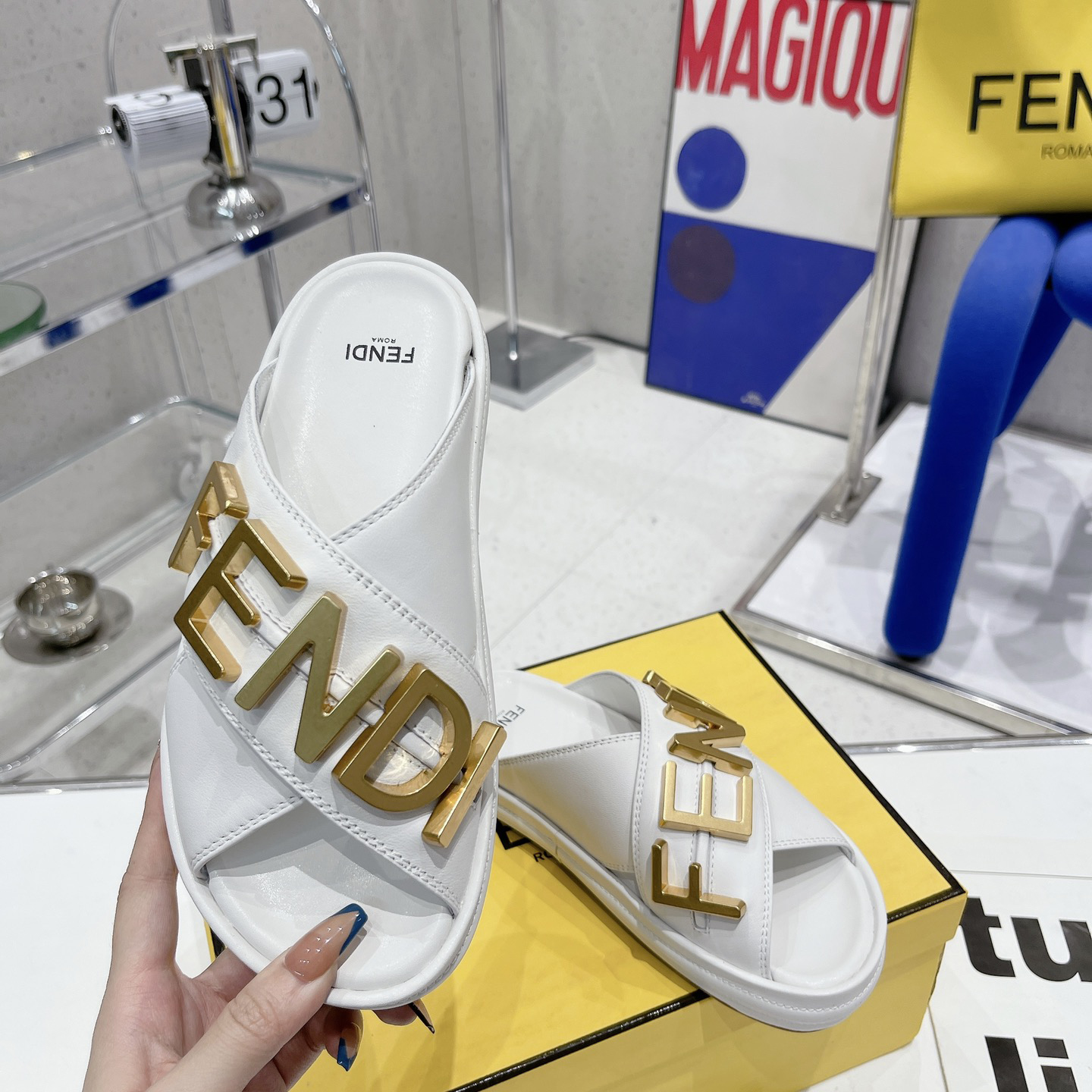Fendi Graphy White Leather Slides - FashionPlug