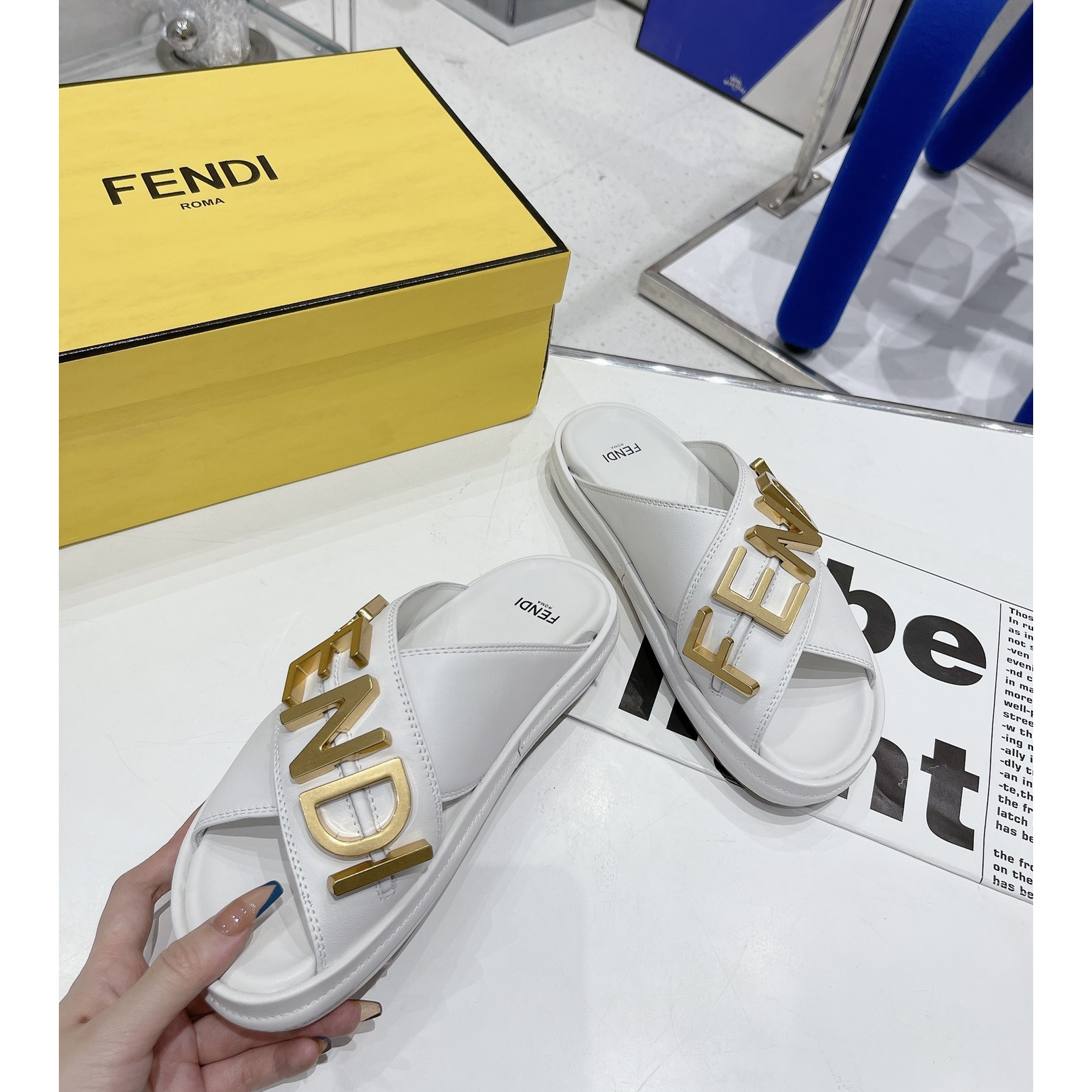 Fendi Graphy White Leather Slides - FashionPlug