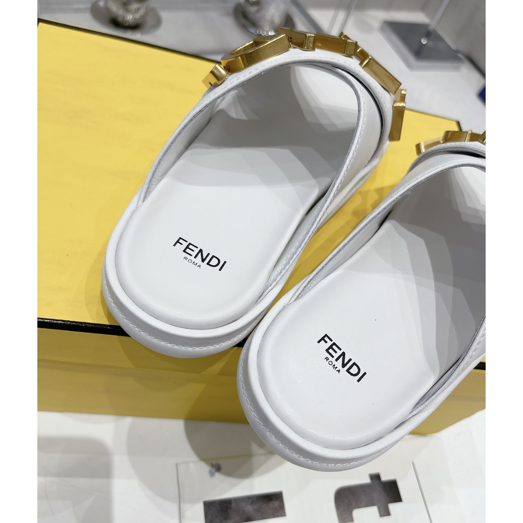 Fendi Graphy White Leather Slides - FashionPlug