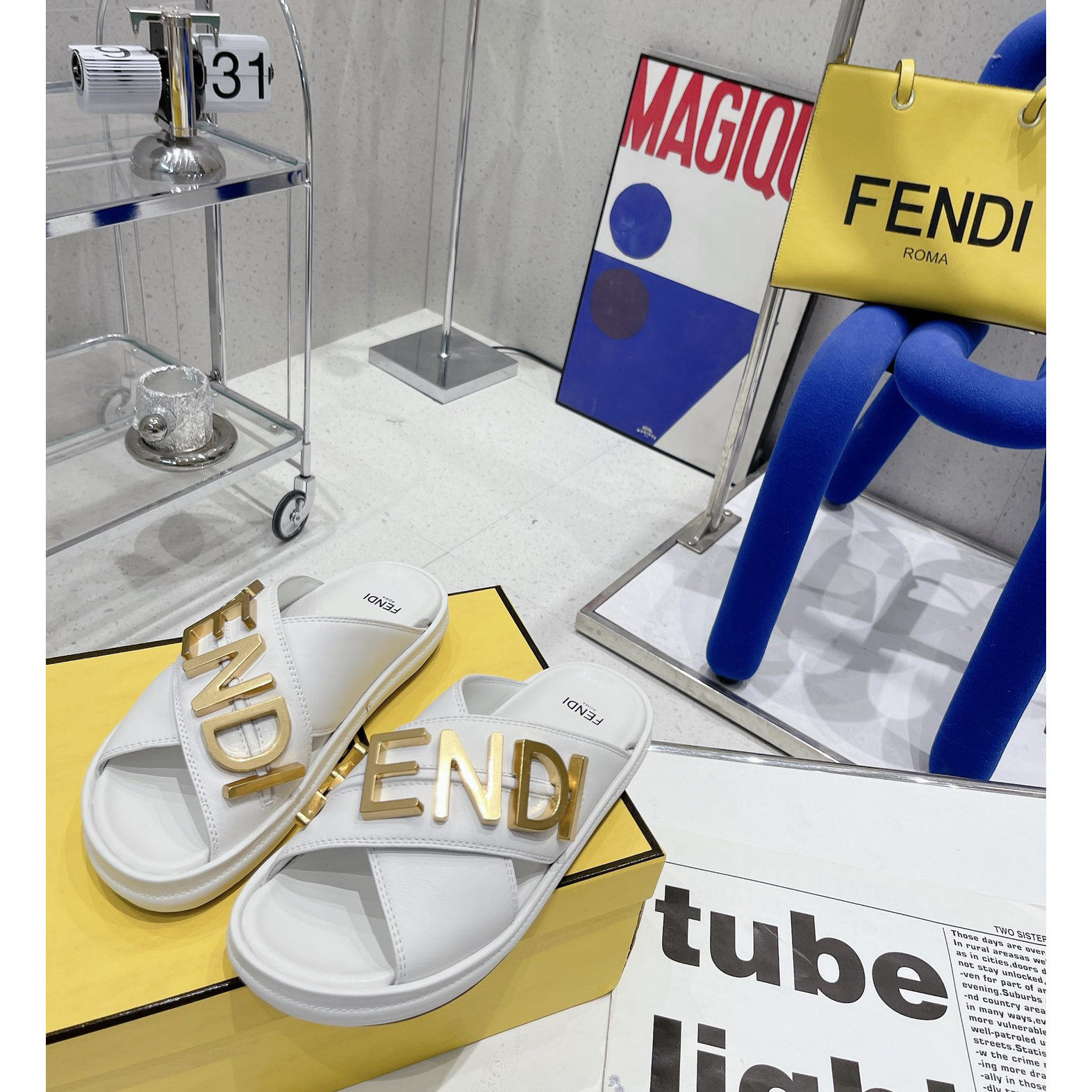Fendi Graphy White Leather Slides - FashionPlug