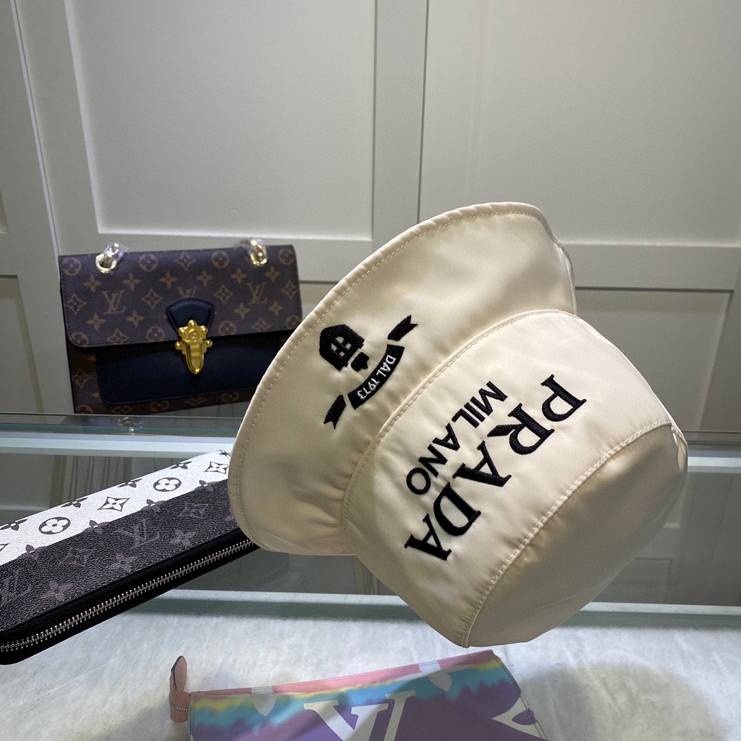 Prada Canvas Bucket Hat - FashionPlug