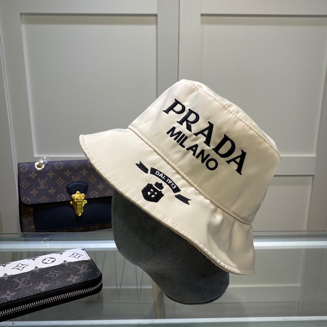 Prada Canvas Bucket Hat - FashionPlug