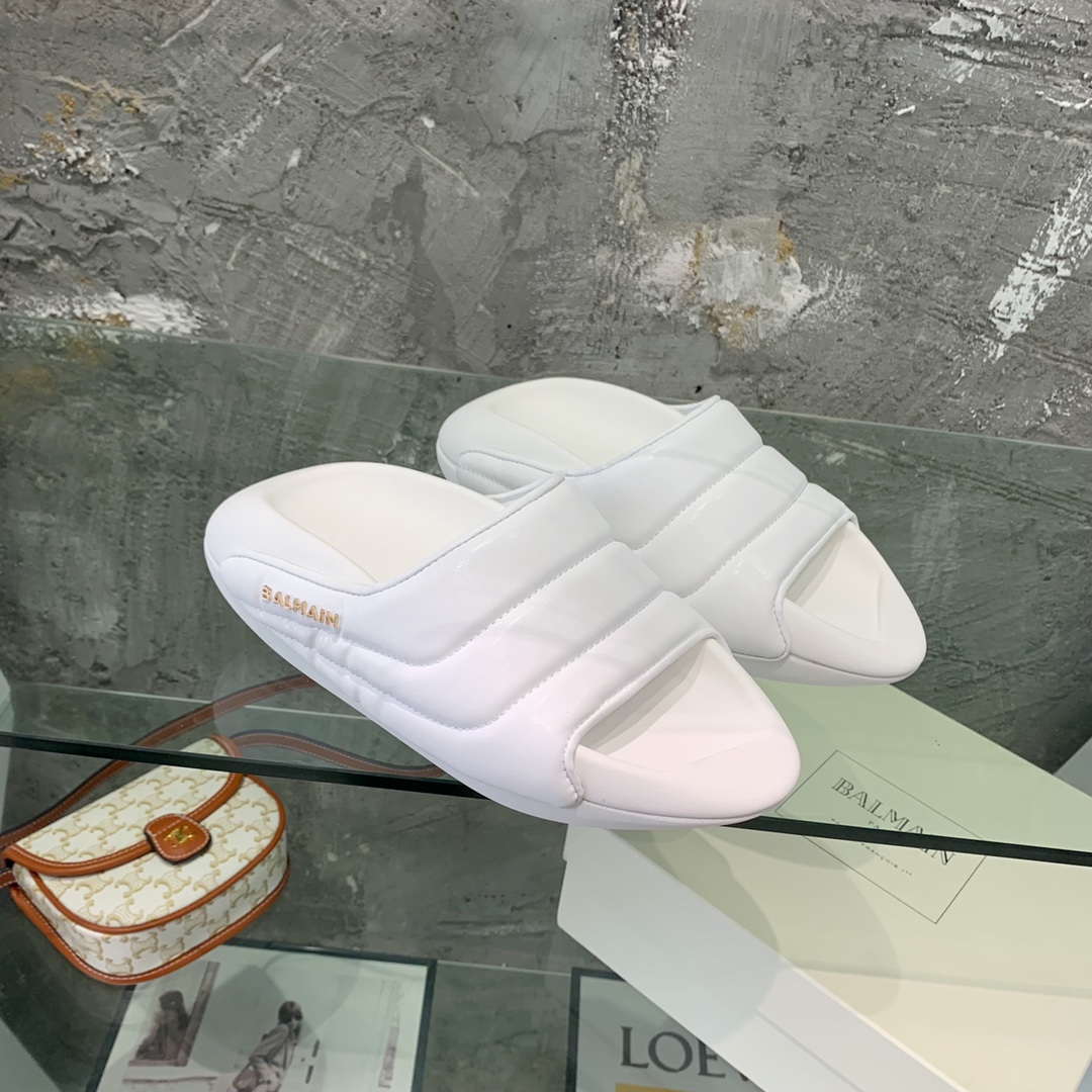 Balmain B-It-Puffy Slides - FashionPlug