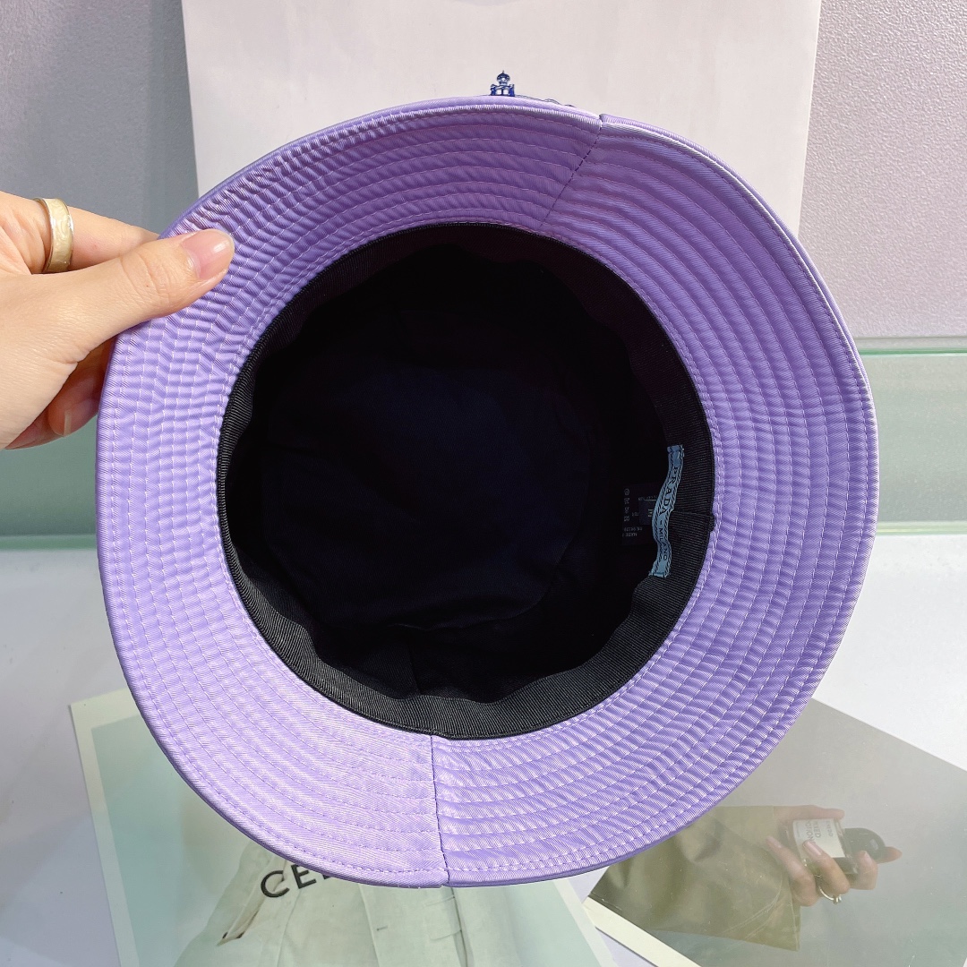 Prada Canvas Bucket Hat - FashionPlug